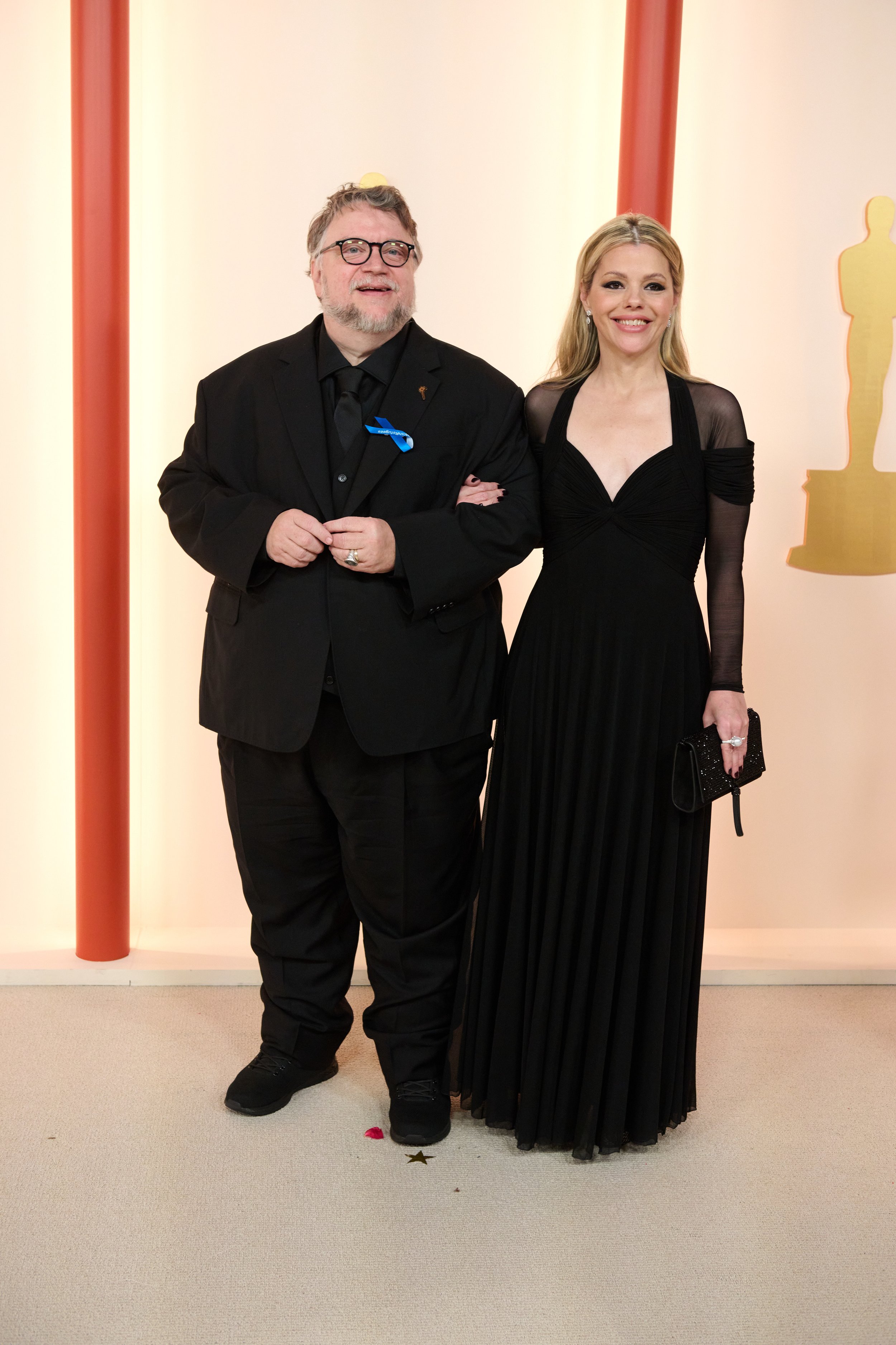 Oscar® nominee Guillermo del Toro arrives with Kim Morgan on the red carpet of The 95th Oscars