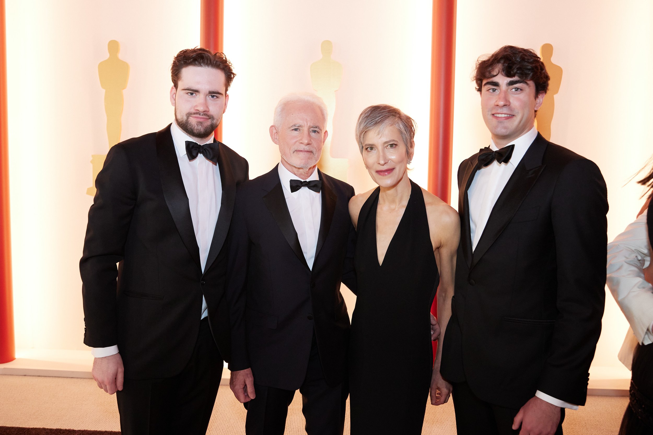 Oscar® nominee Patrick McCormick arrives with guests on the red carpet of The 95th Oscars