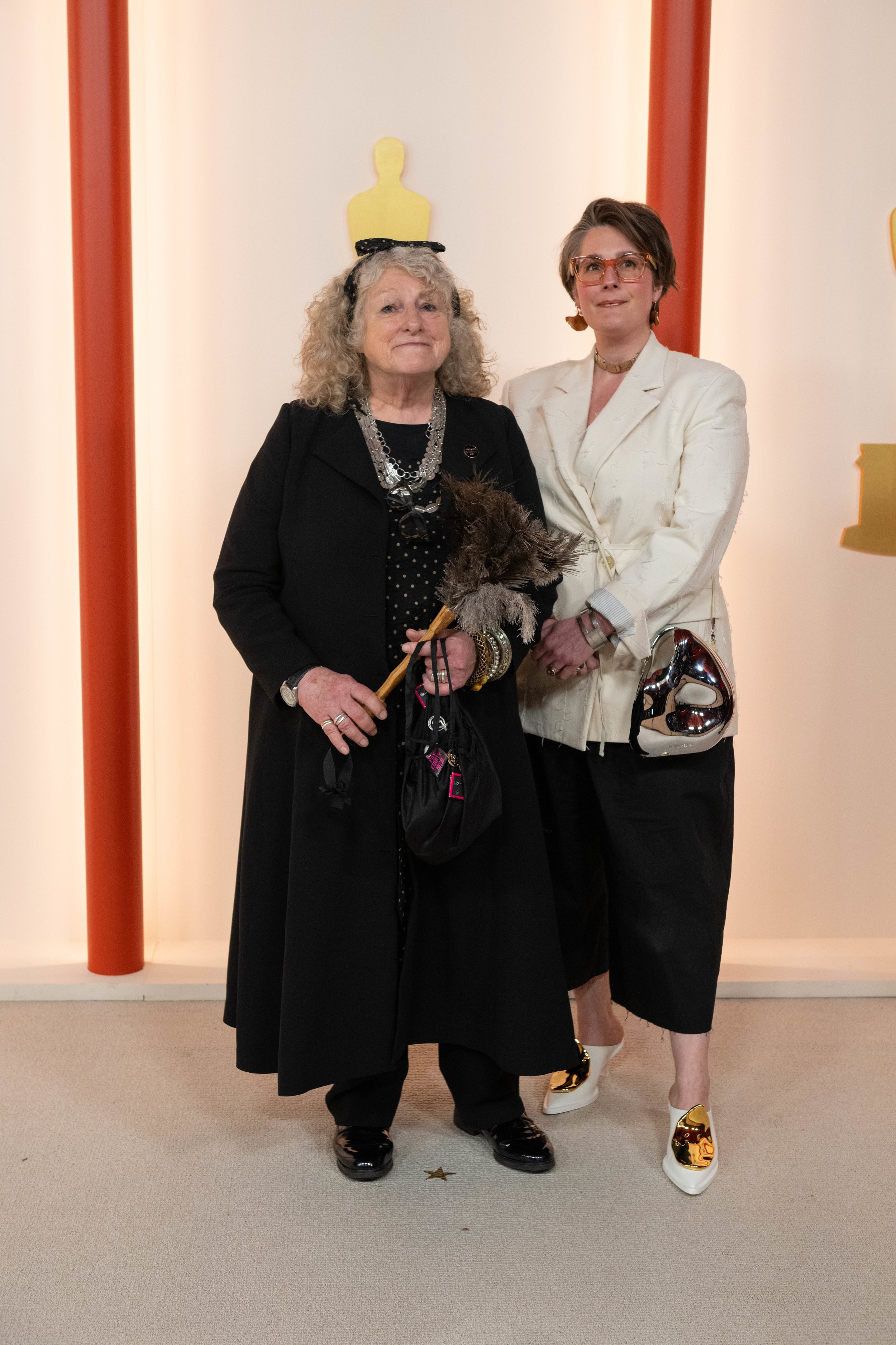Oscar® nominee Jenny Beavan and guest arrive on the red carpet of the 95th Oscars