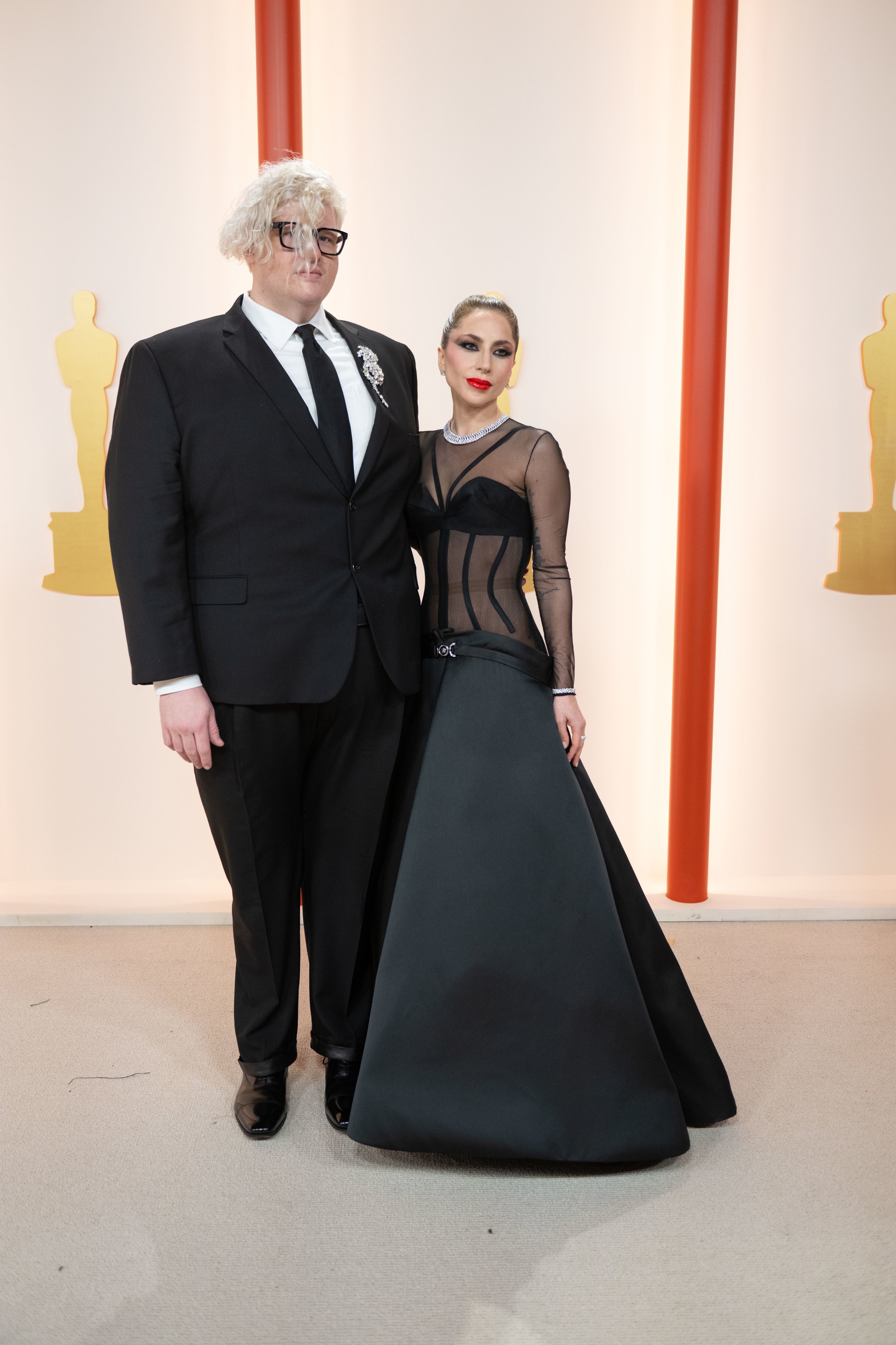  (l-r) BloodPop, Lady Gaga arrives on the red carpet of The 95th Oscars