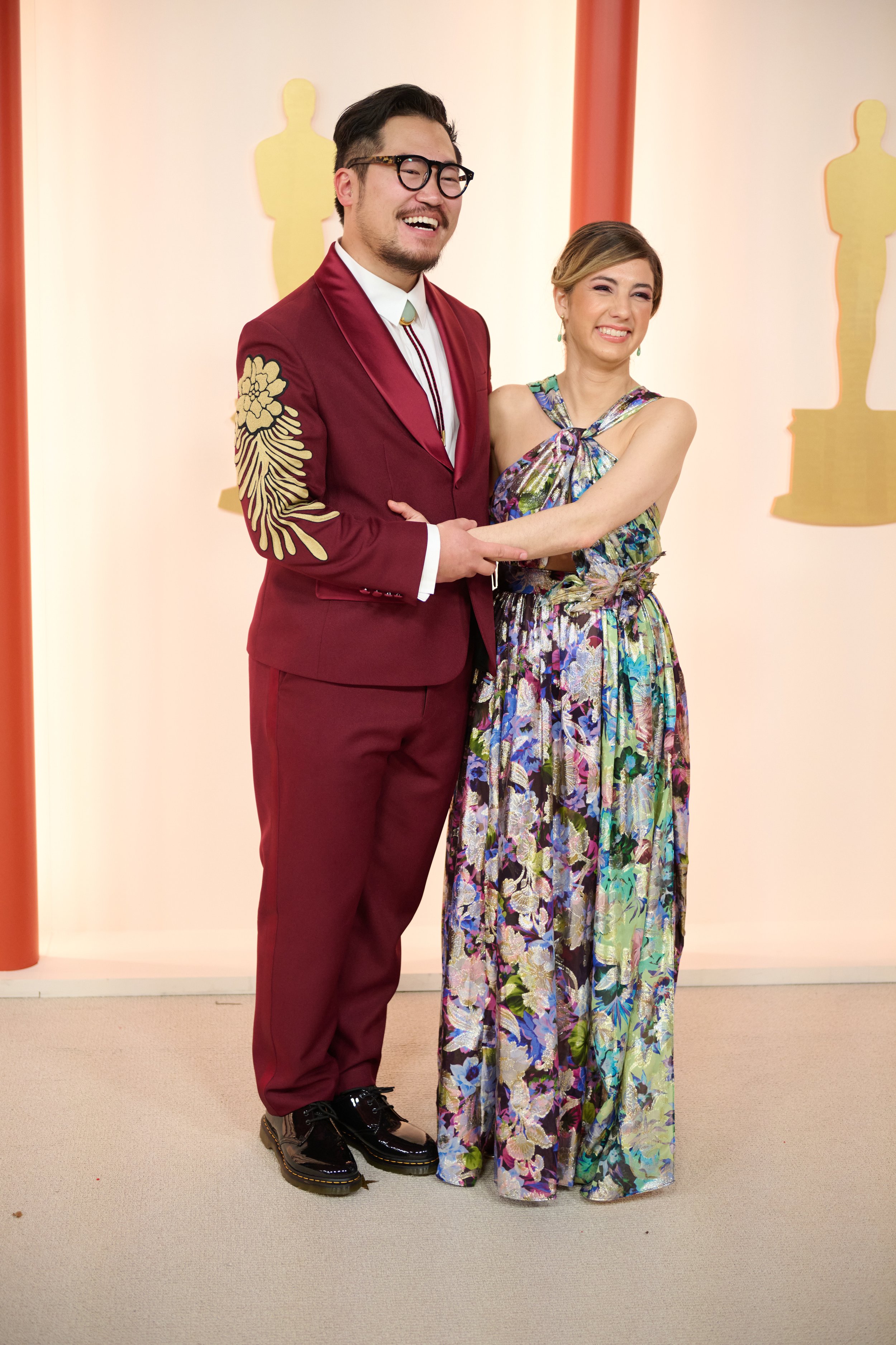 Oscar® nominee Daniel Kwan arrives with Kirsten Lepore on the red carpet of The 95th Oscars