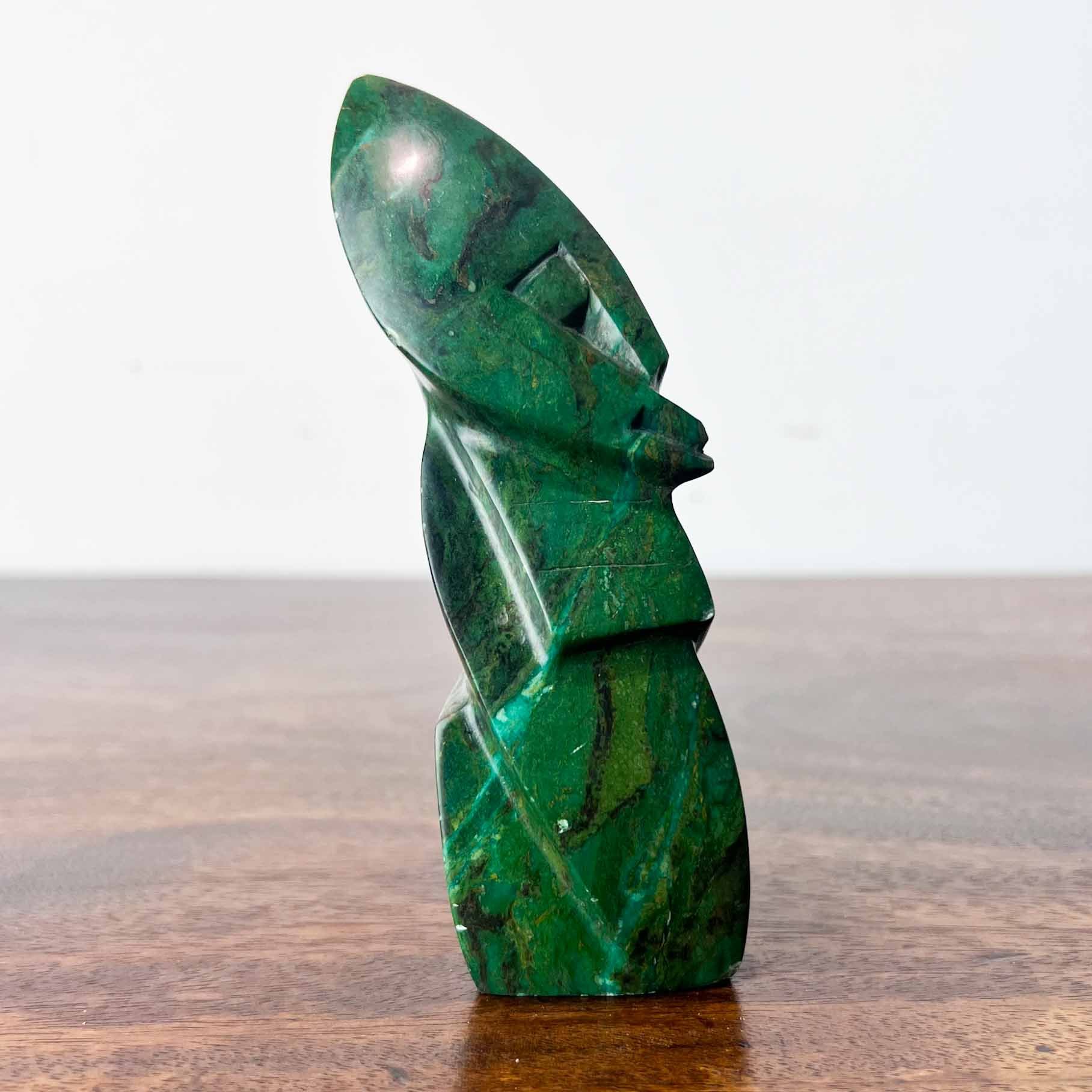 carved malachite figurine