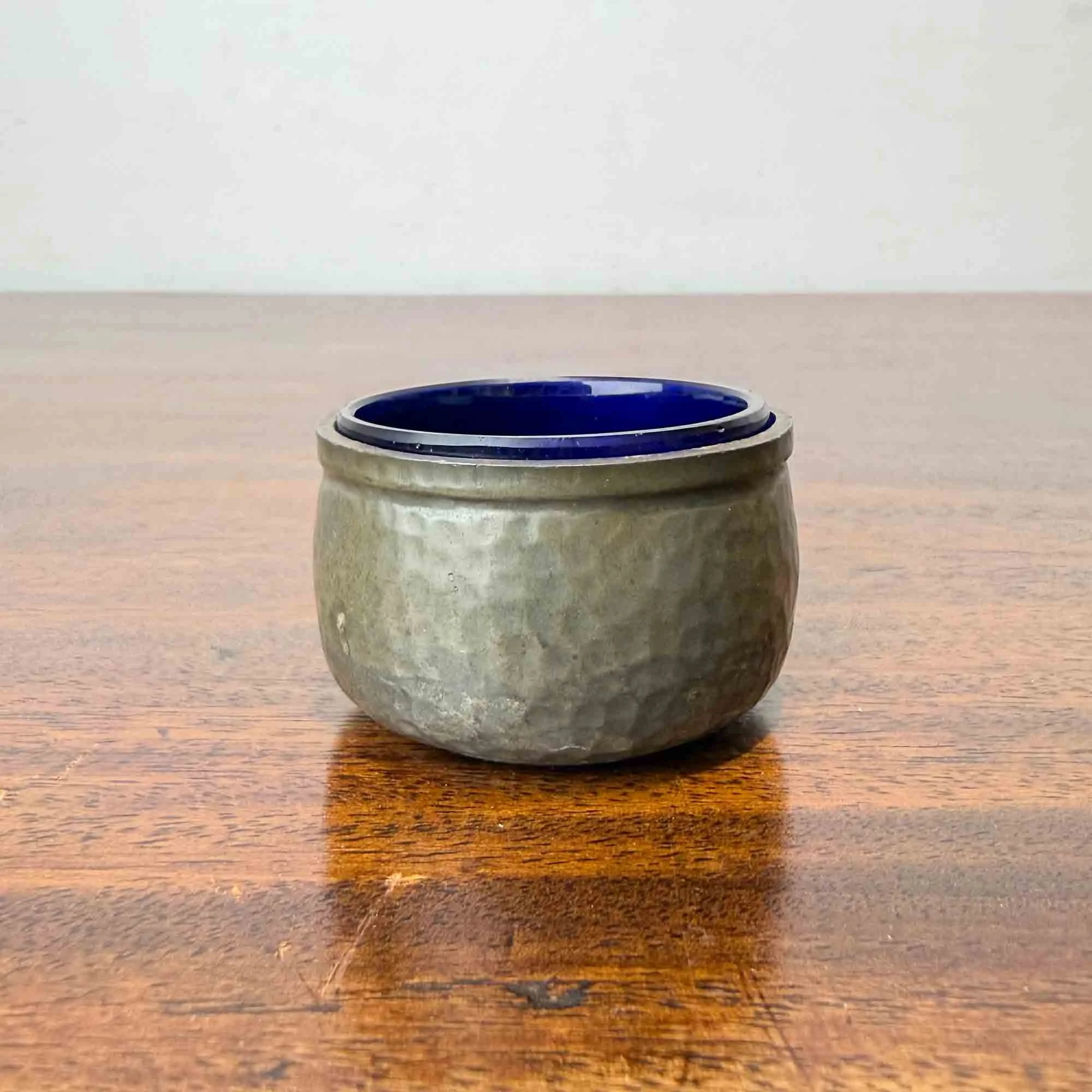 Lion hammered pewter salt with bristol blue glass liner
