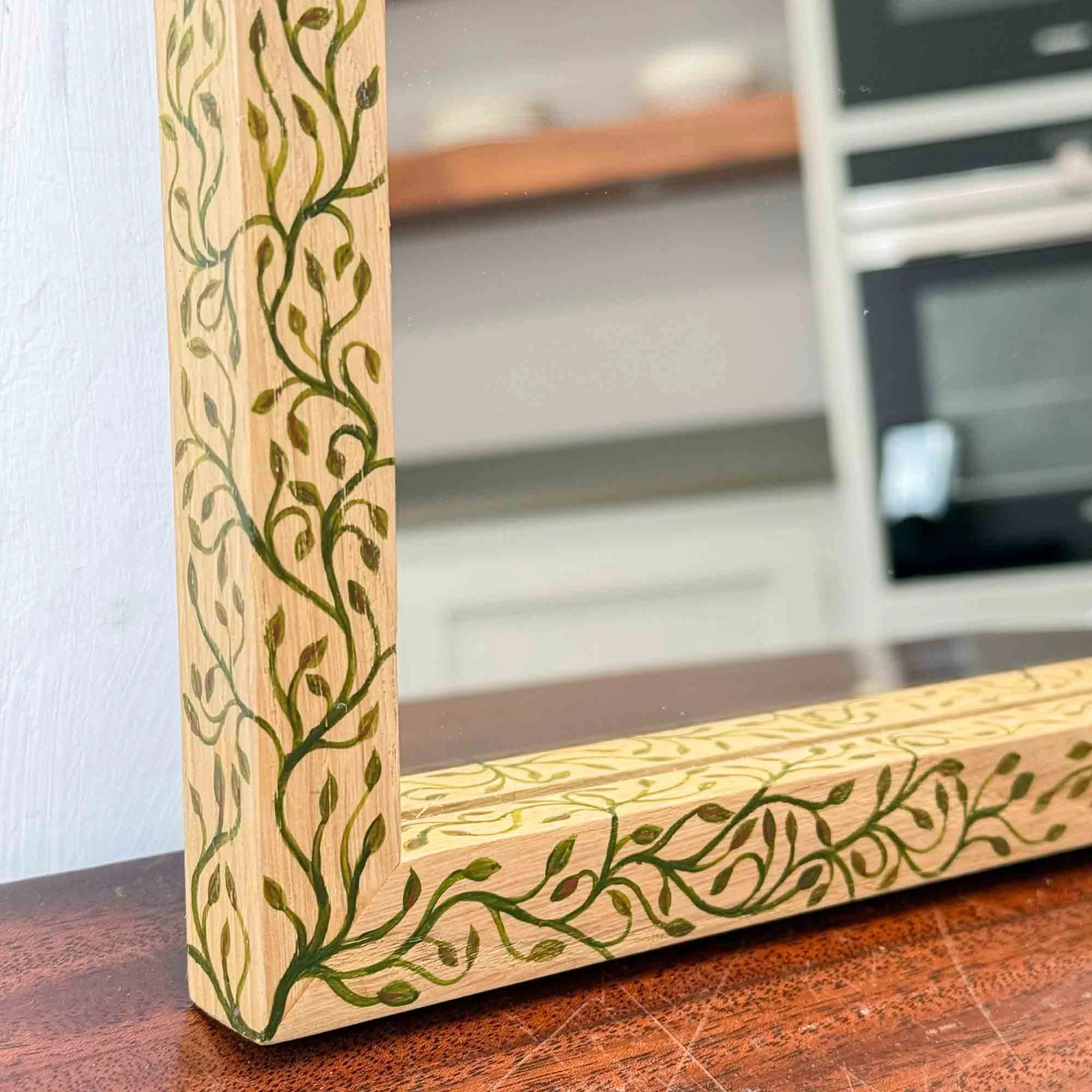 hand made oak mirror with hand painted decoration