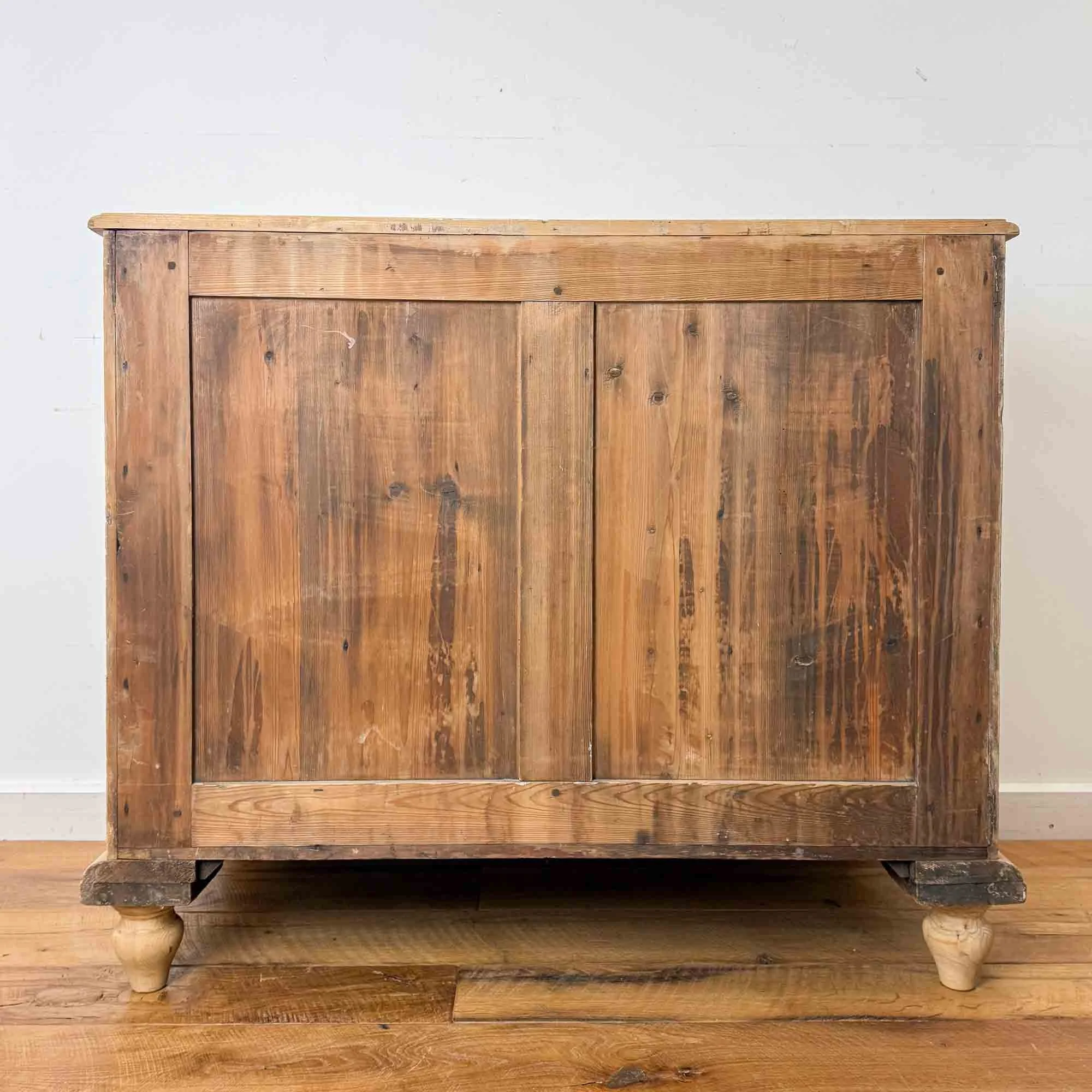 antique pine chest of drawers with glass knobs.jpg