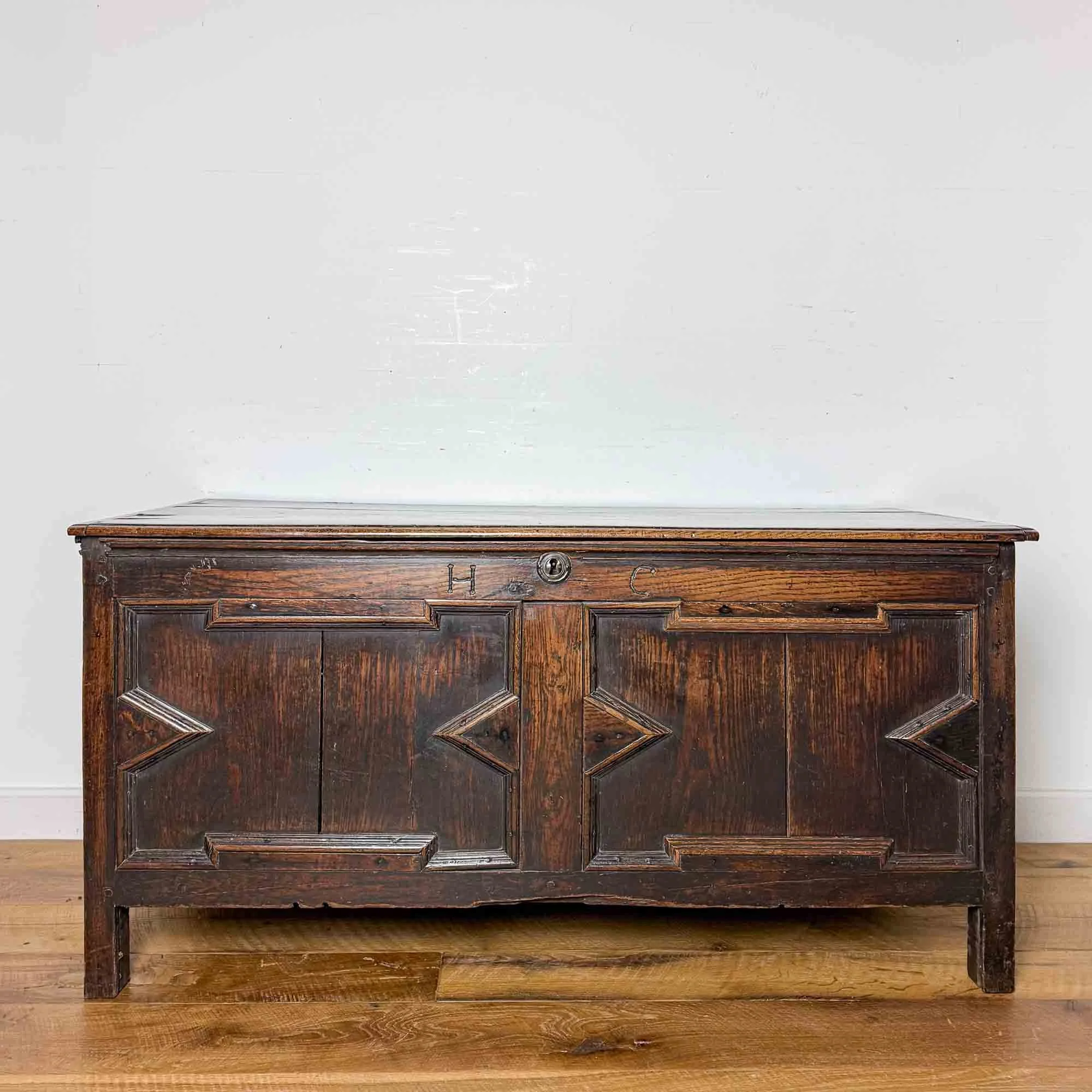 geometric panelled antique oak coffer
