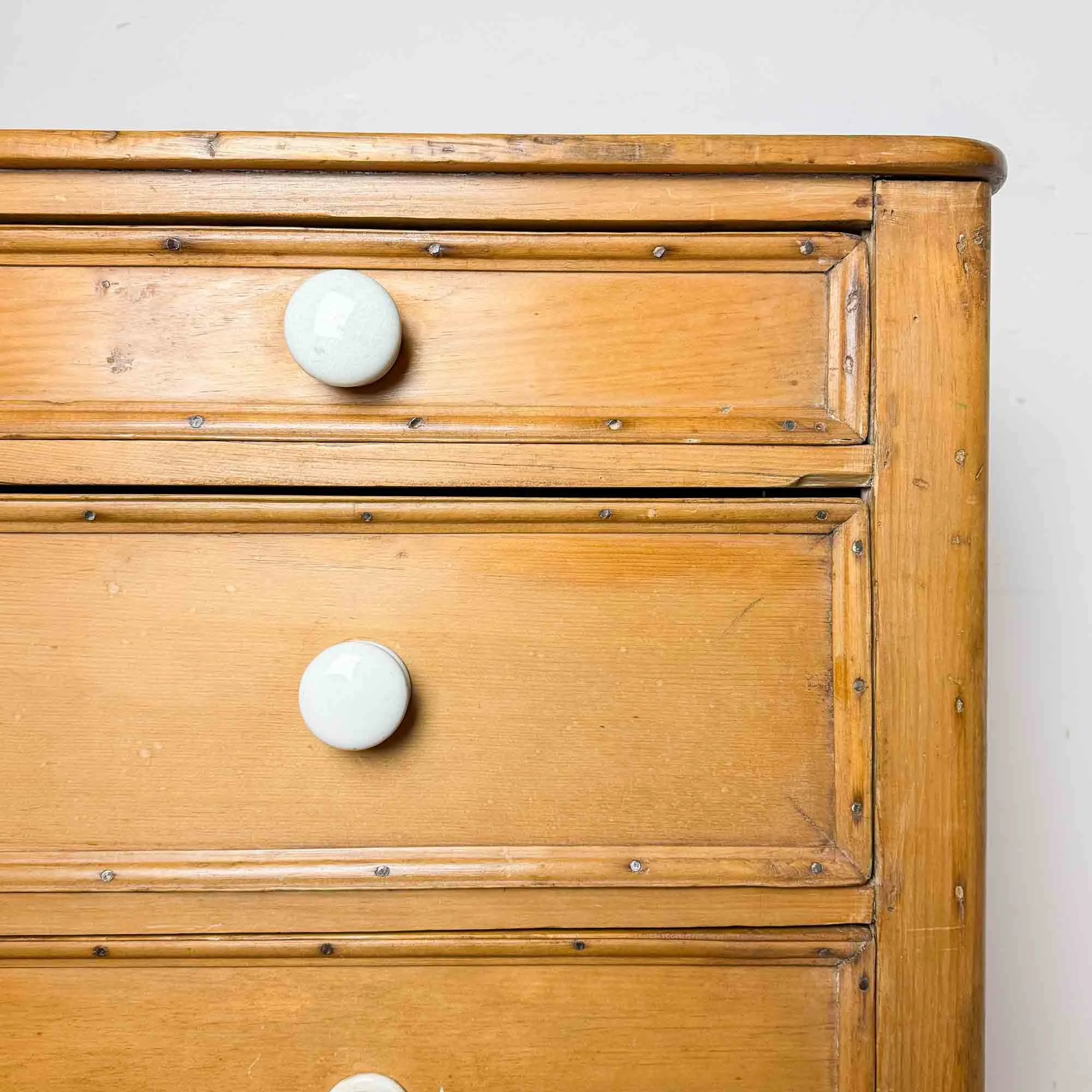 antique pine chest of drawers with ceramic knobs