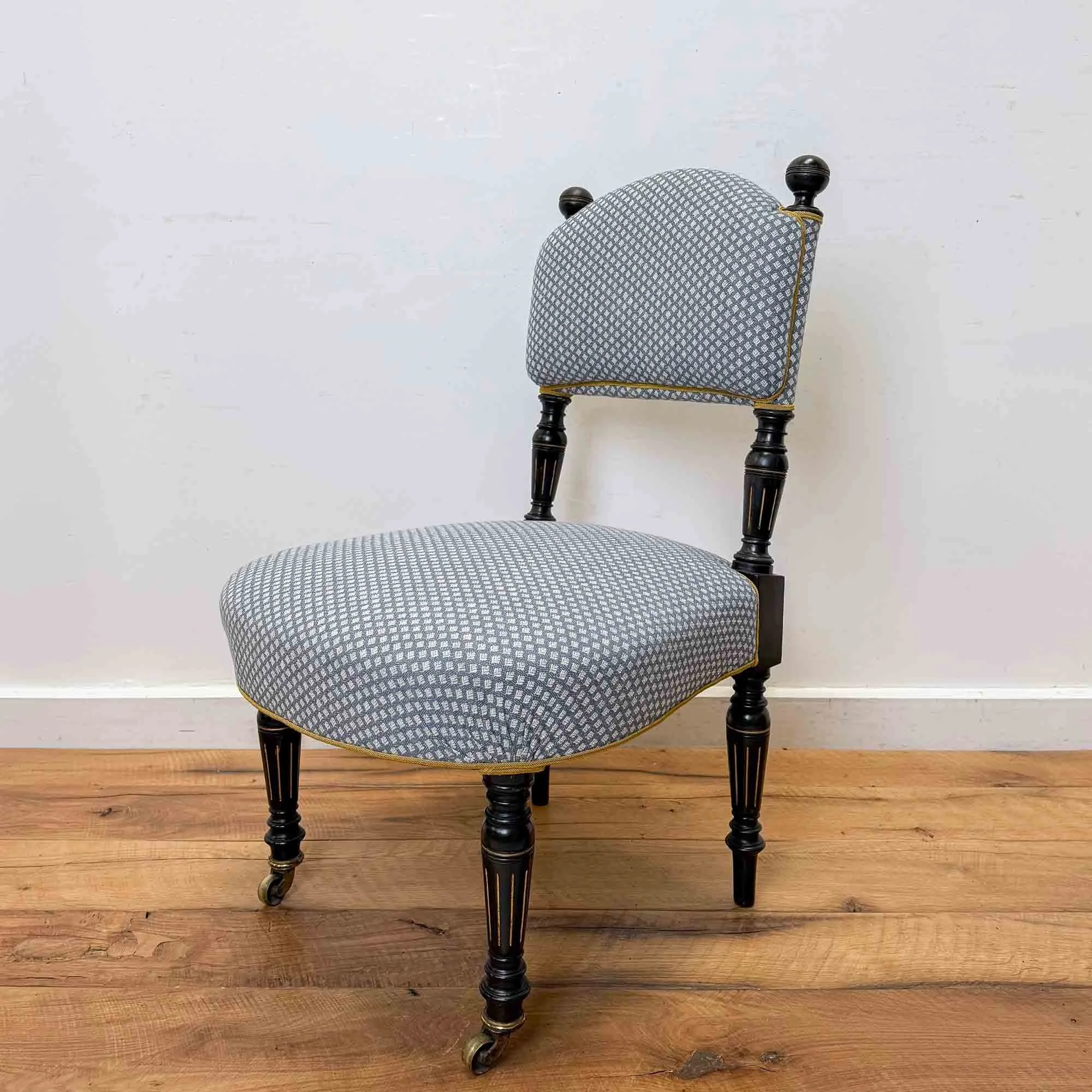 blue upholstered aesthetic movement chair