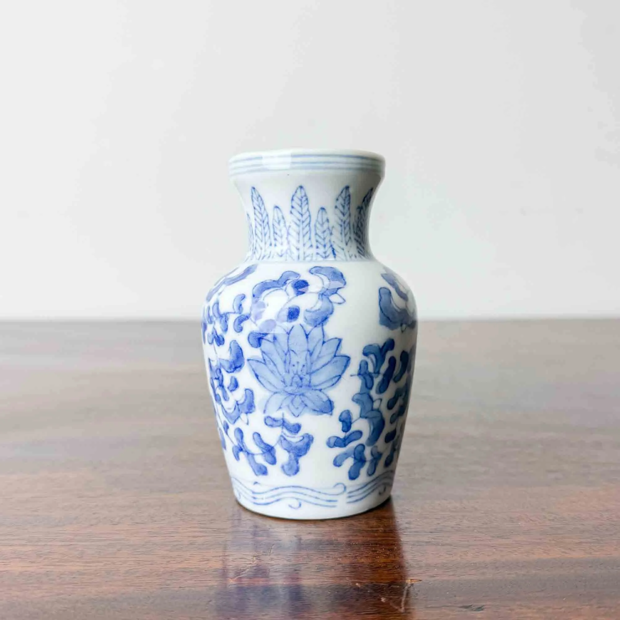 small vintage blue and white vase
