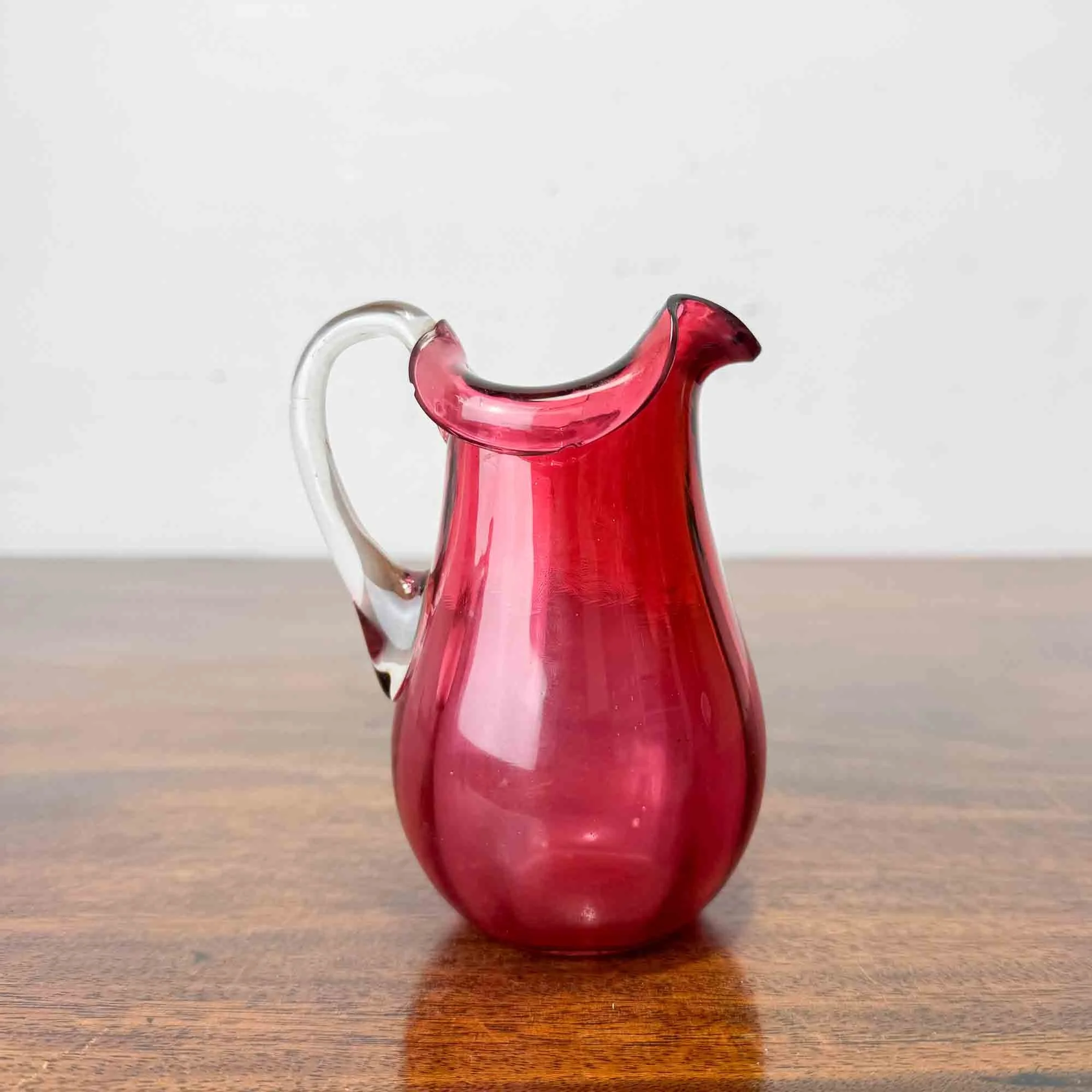 small 19th century cranberry glass jug