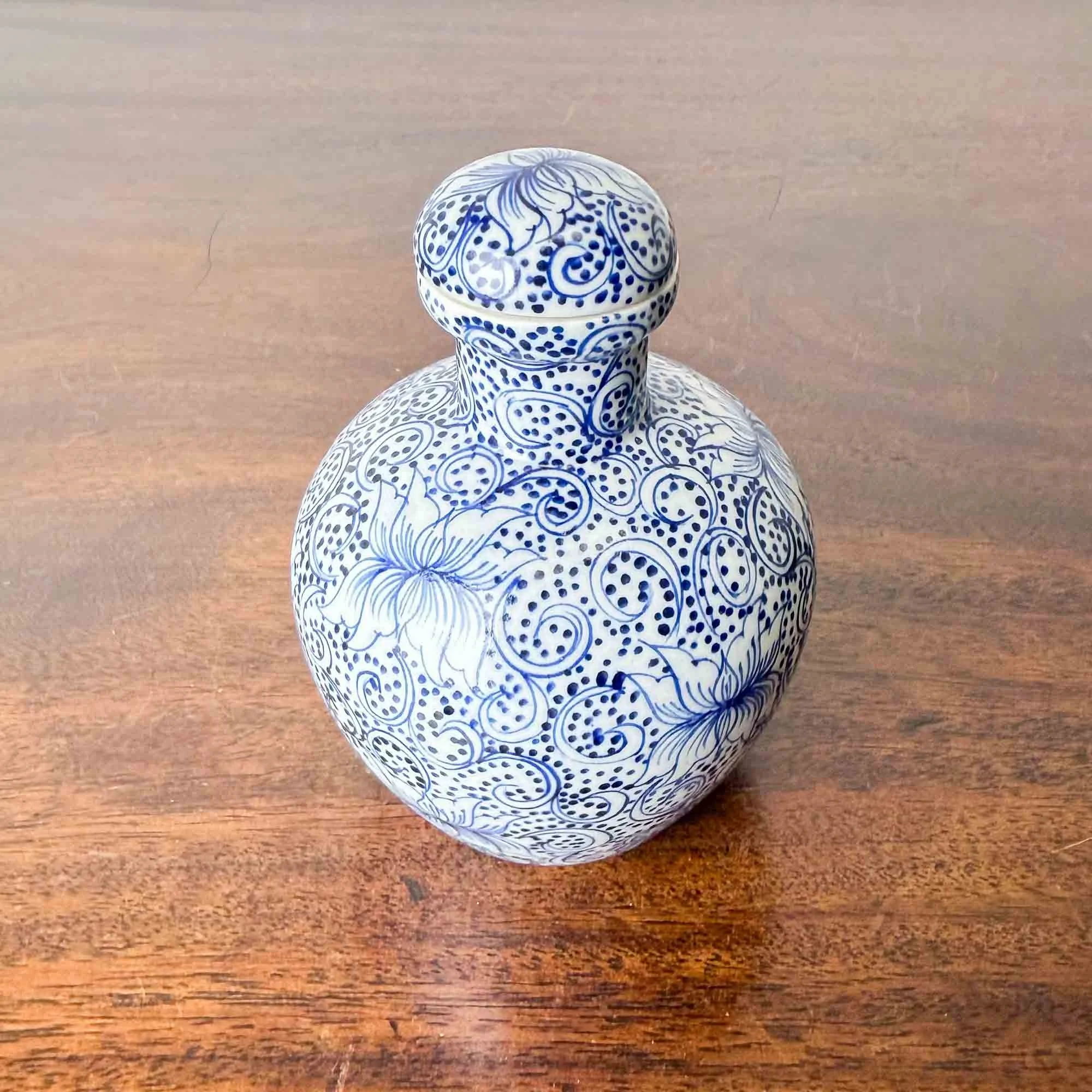 blue and white jar with lid
