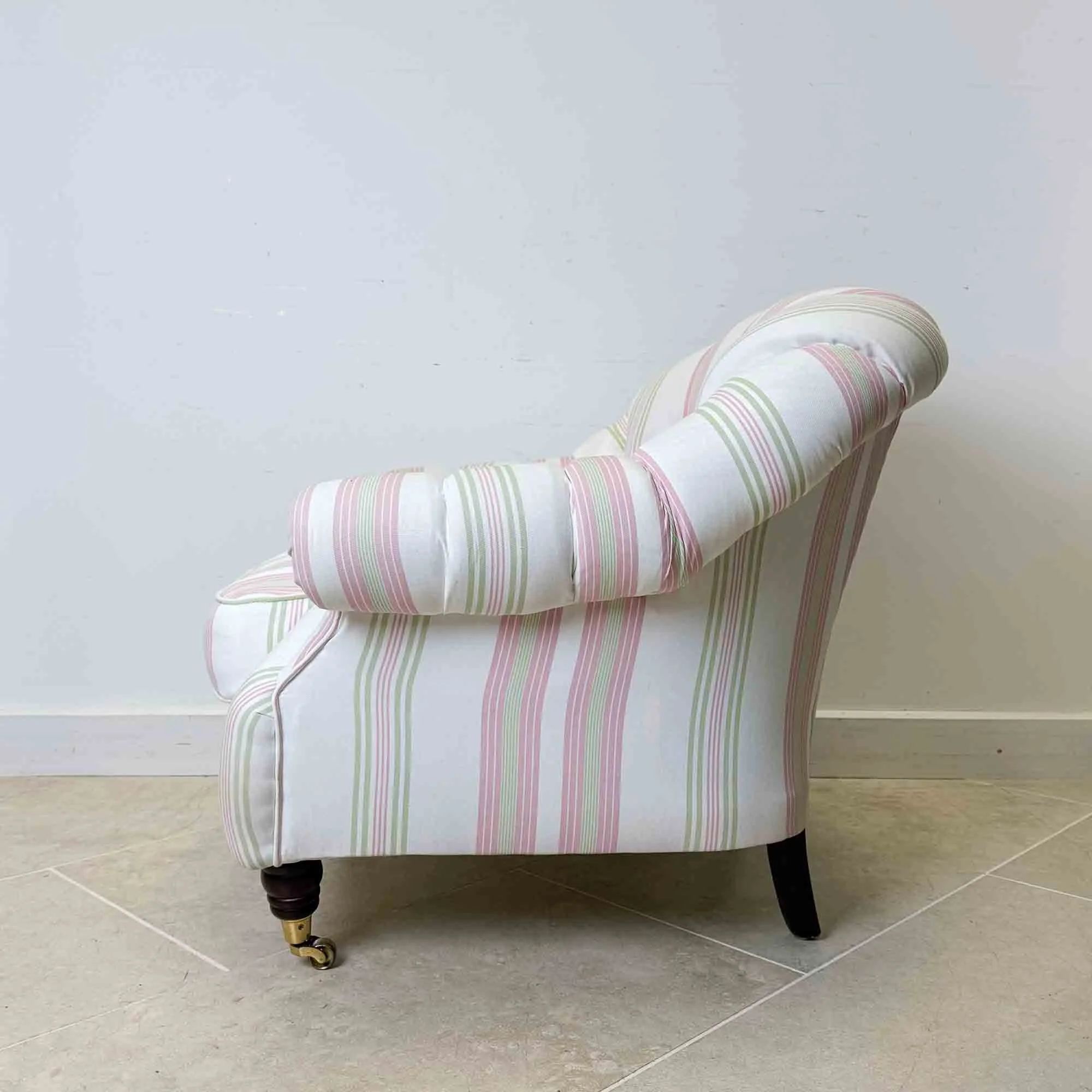 pink and green stripe tub chair