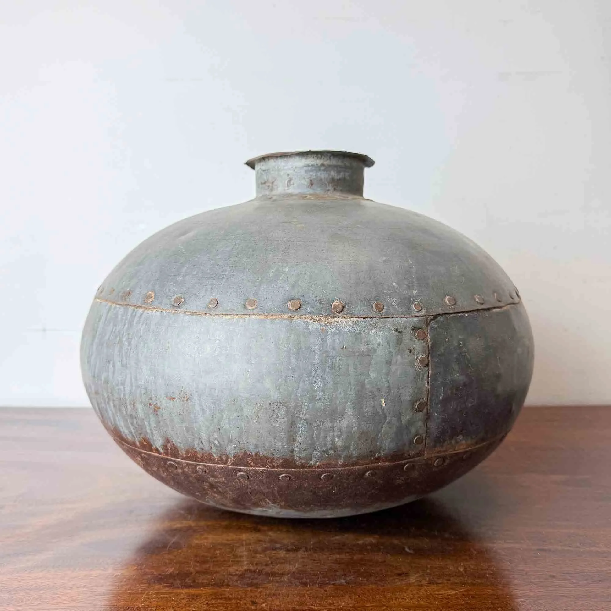 decorative vintage riveted metal water pot