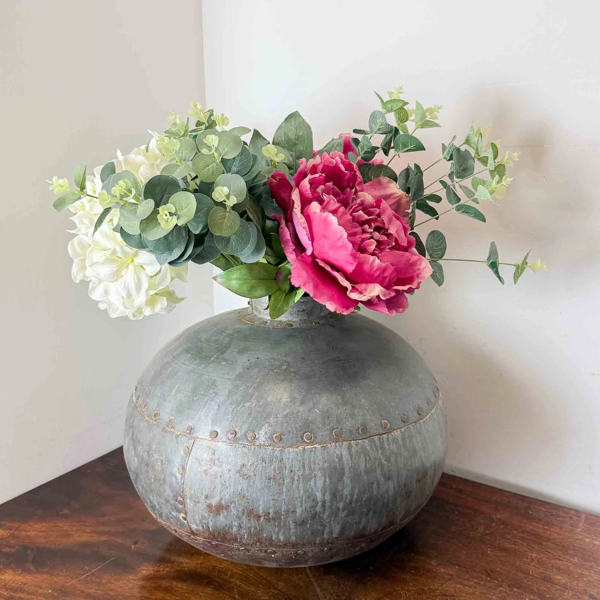 riveted metal water pot.jpg