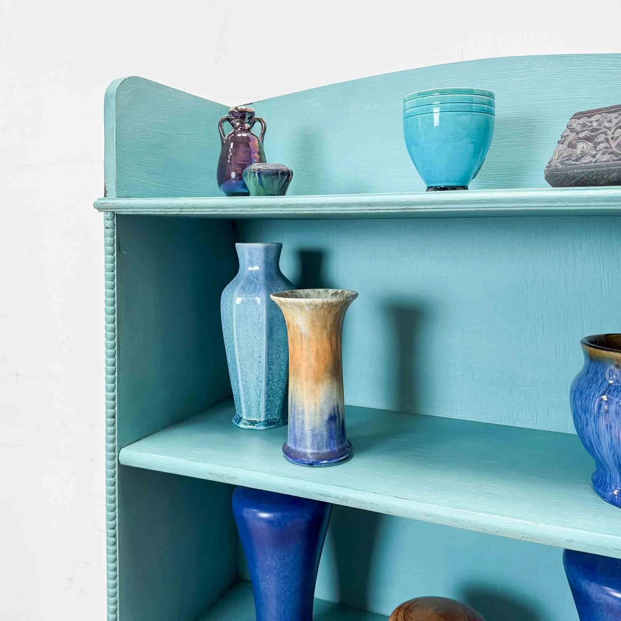 vintage painted turquoise bookshelf.jpg