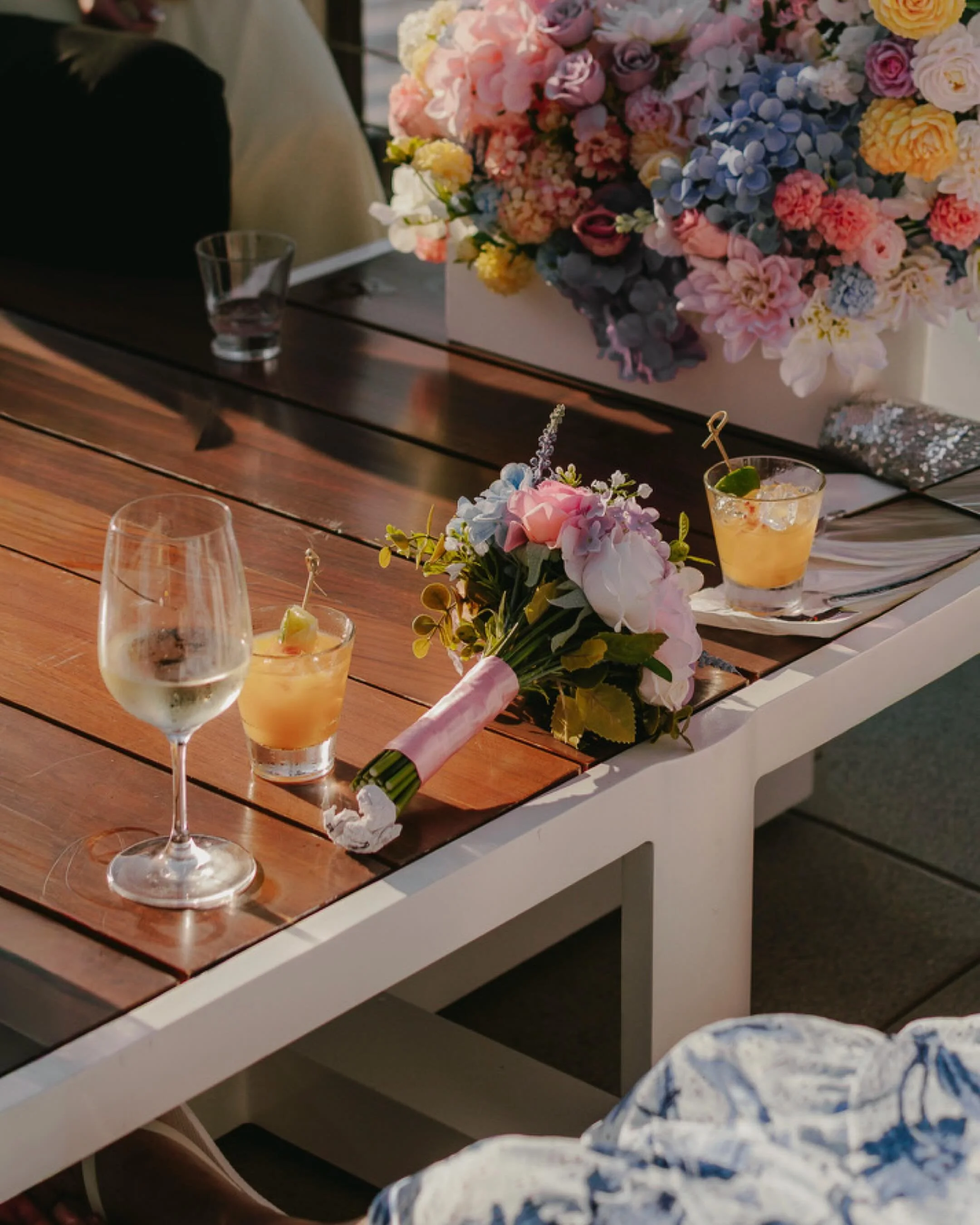 A few of the details that made it theirs. The flowers, the grand entrance at the yacht club, the bouquet riding along, and a cake worth the wait.

Associate for: @jenhebertphotography 
Venue: @newportharboryc 
DJ: @thedjsg 
Makeup: @makeupbyaneesa 
V