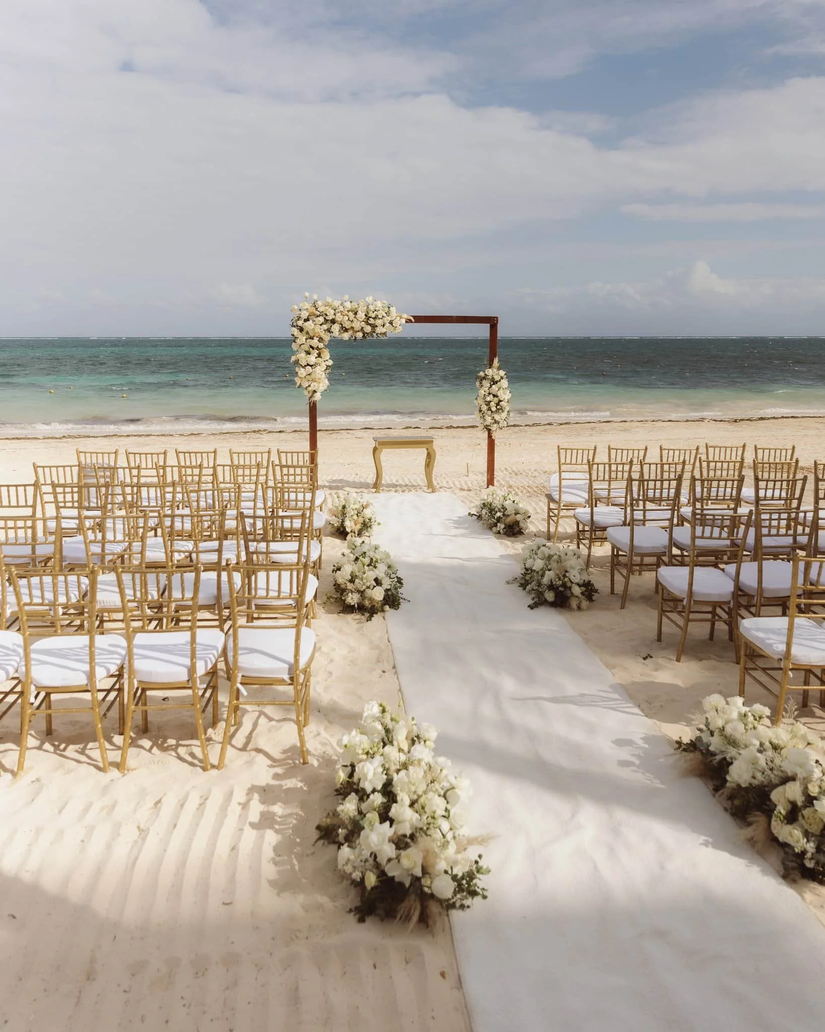 Gulf Coast wedding photographer captures beach ceremony setup in Cancun, Mexico