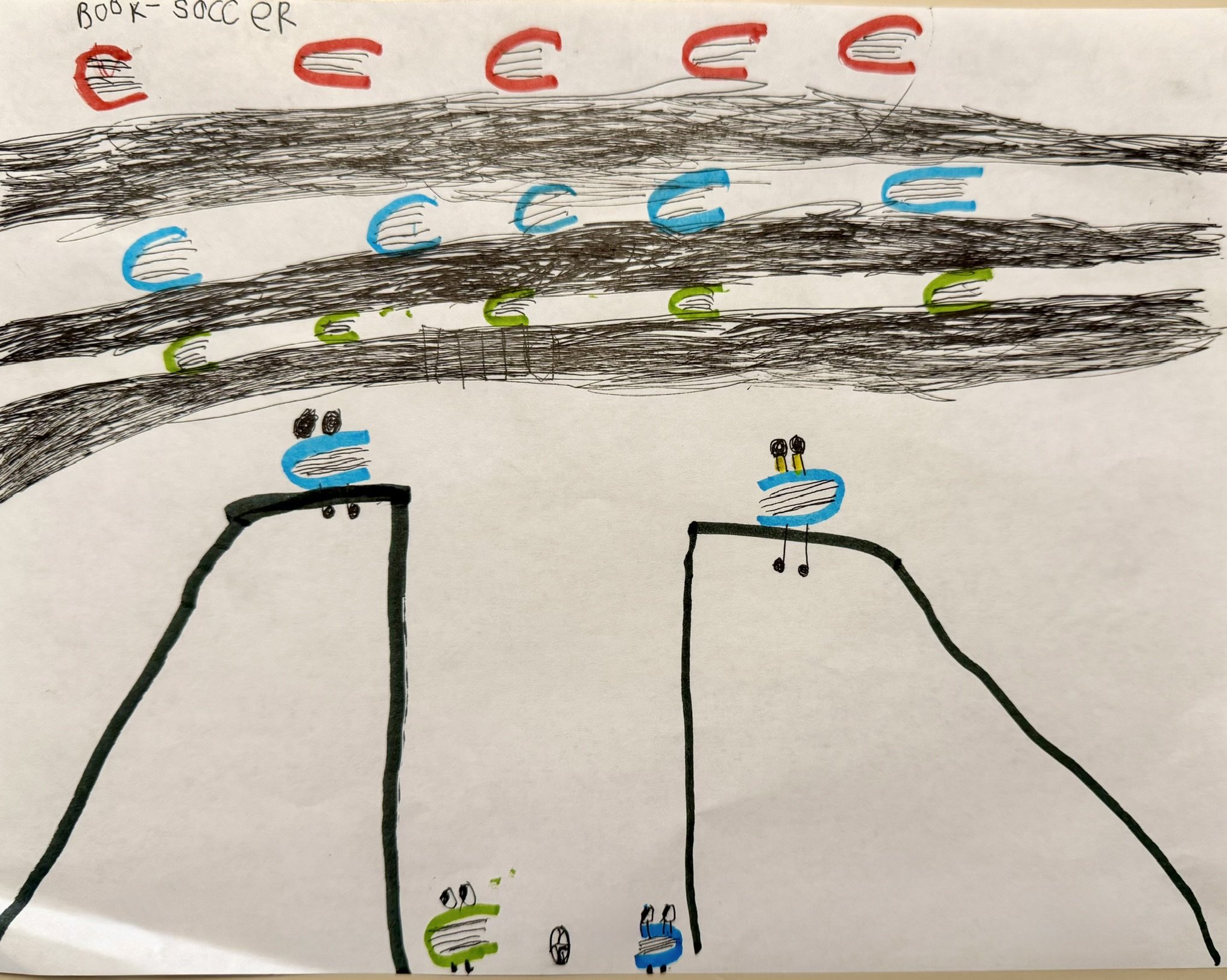 2. Title: Book Soccer, Description: This piece shows what books do when they have some time off. Play soccer, and watch soccer!