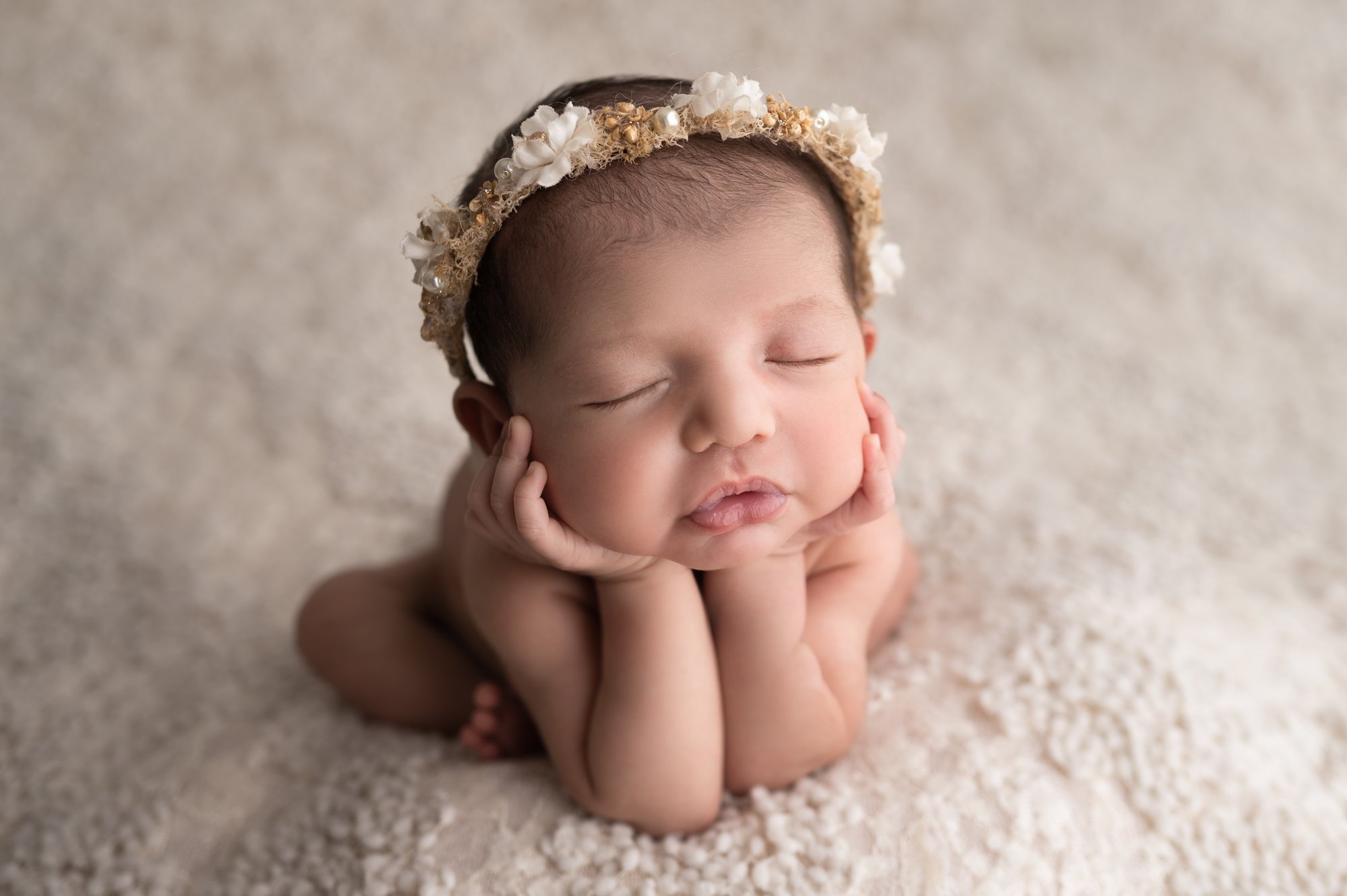 newborn baby girl with hands on chin columbus ohio newborn photographer