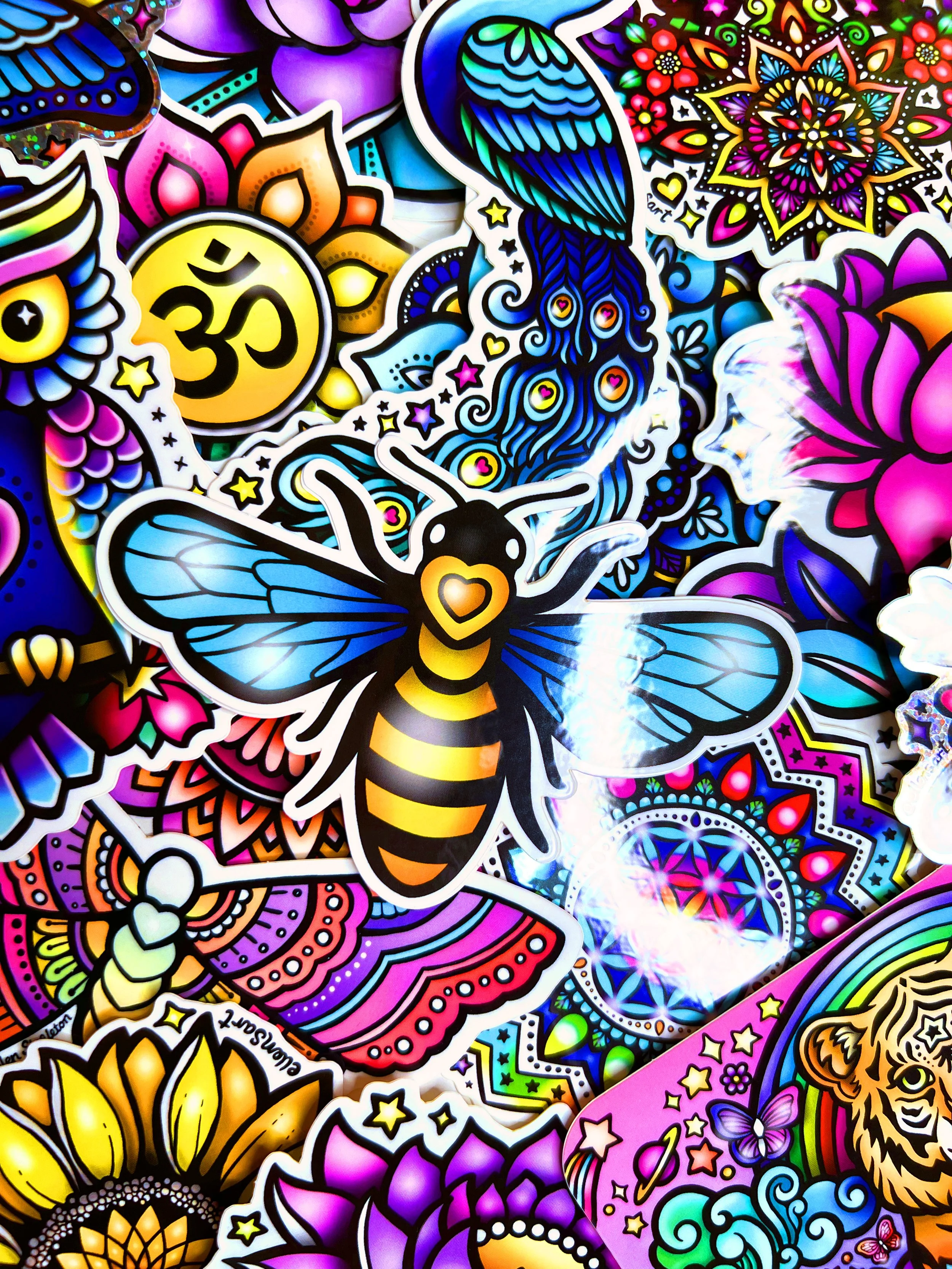 Mystery sticker pack of 10 waterproof vinyl stickers with mandalas, animals, and spiritual designs. Ideal for laptops, cars, water bottles, notebooks, or planners. Fun, colorful gift.