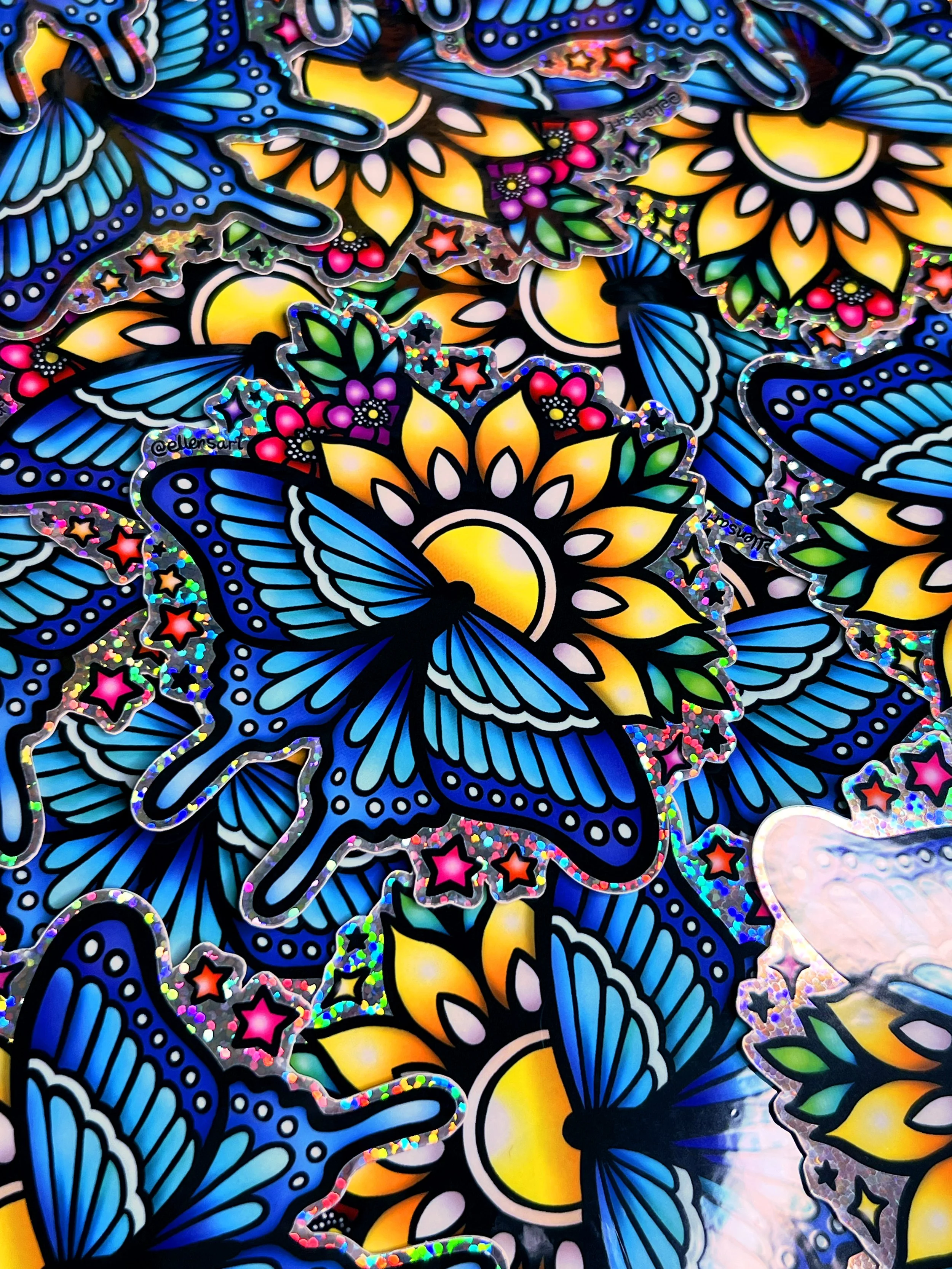 Holographic glitter butterfly flower mandala sticker on waterproof vinyl. Great for laptops, cars, water bottles, planners, or notebooks. Boho, yoga, spiritual gift.