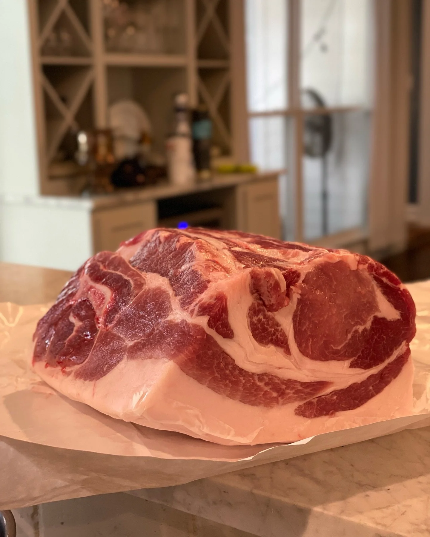 And on the table &hellip; a 10lb pork shoulder from @iverstinebutcher salted overnight and roasted at 425&deg; for about an hour, then coated in an anchovy-walnut butter and cooked for another 3.5 hours. Also featured, a springy salad with some blanc