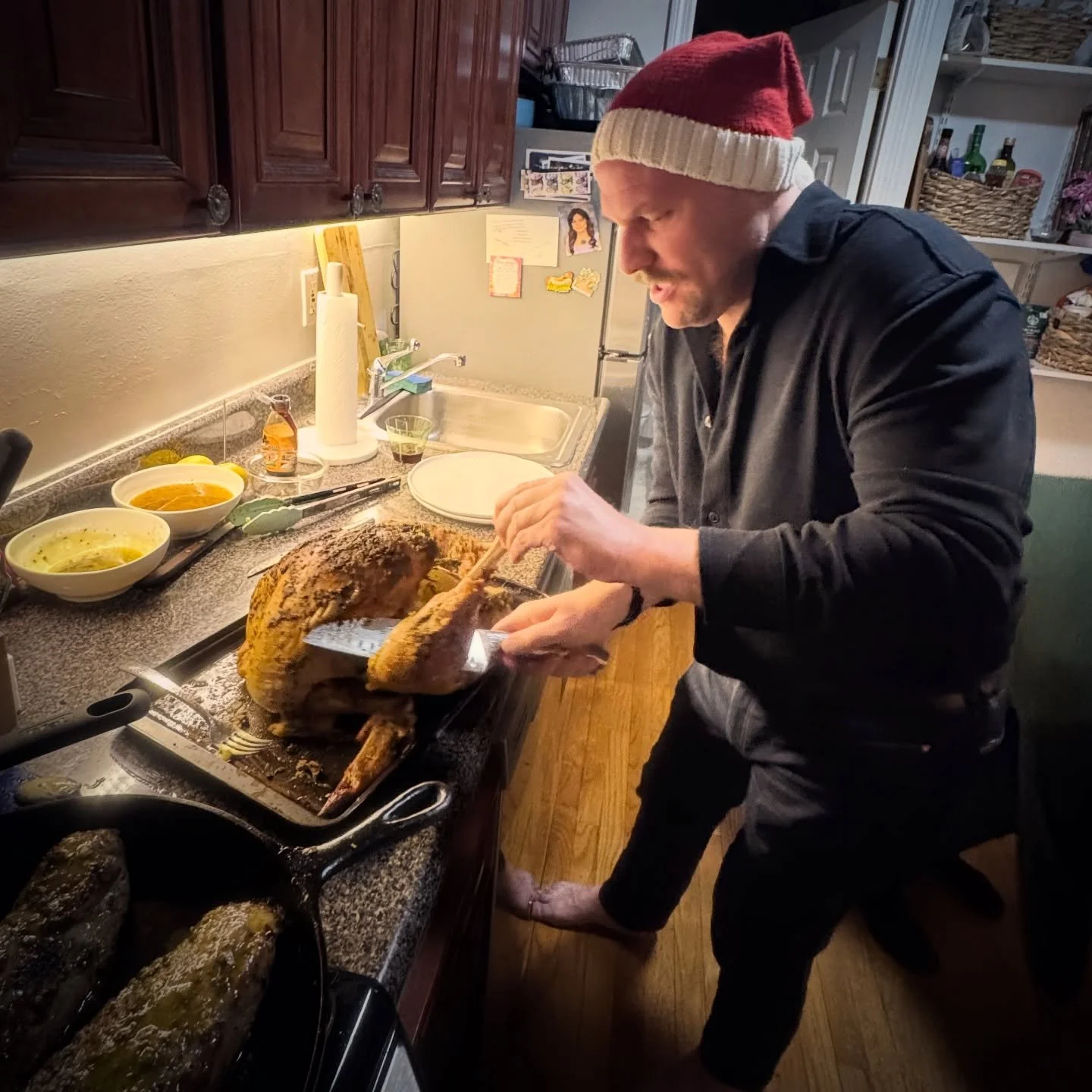 Don&rsquo;t mind me, just your regular holiday dad concentrating way too hard on wielding a knife while barefoot. Call me for all your wild game carving needs this holiday season. Freshly trimmed mustache and Santa hat sold separately. Thank you for 
