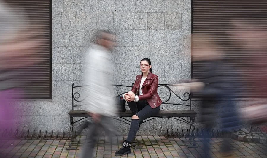 woman sitting on a. bench