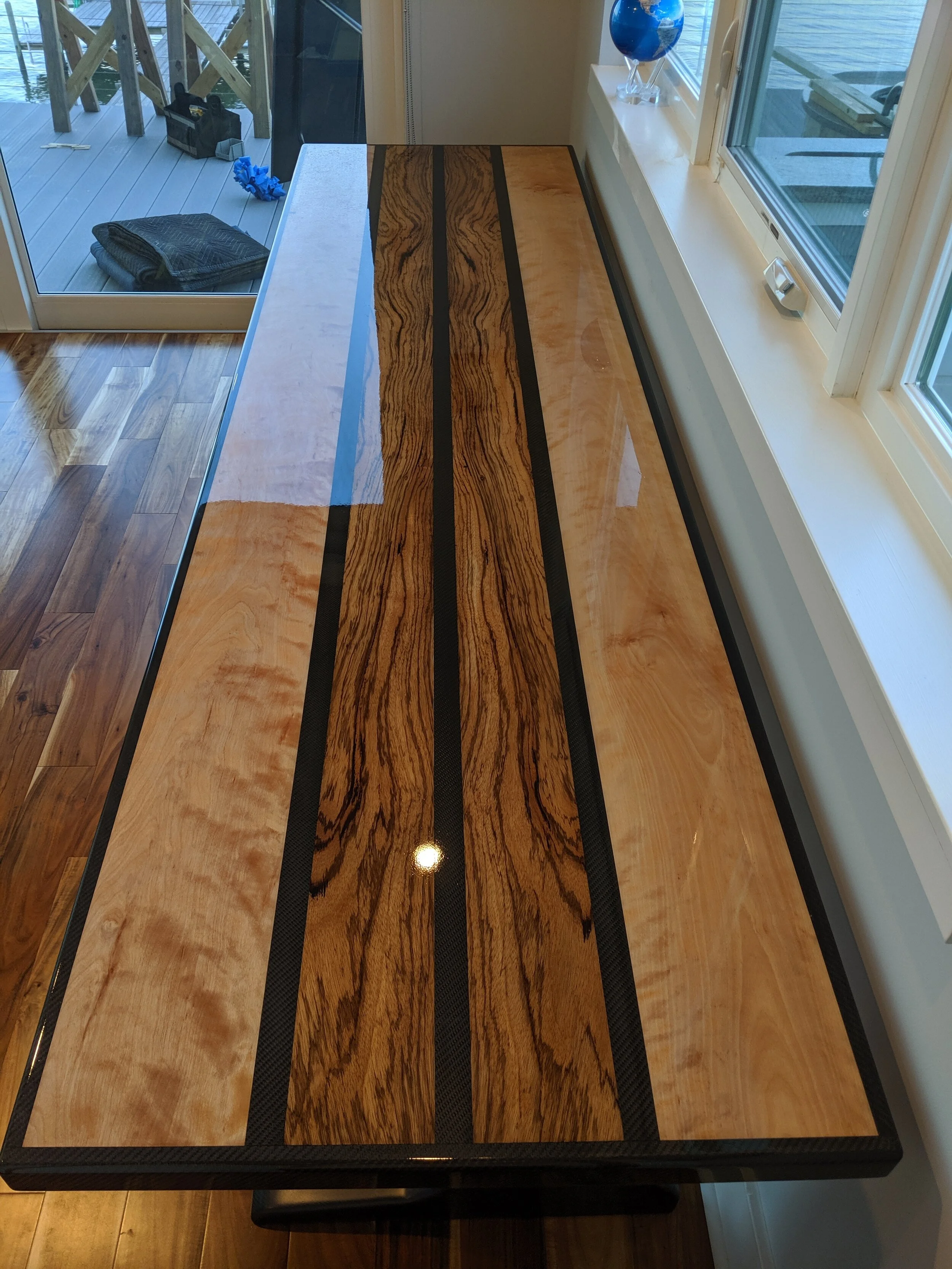 Carbon and wood desk installed