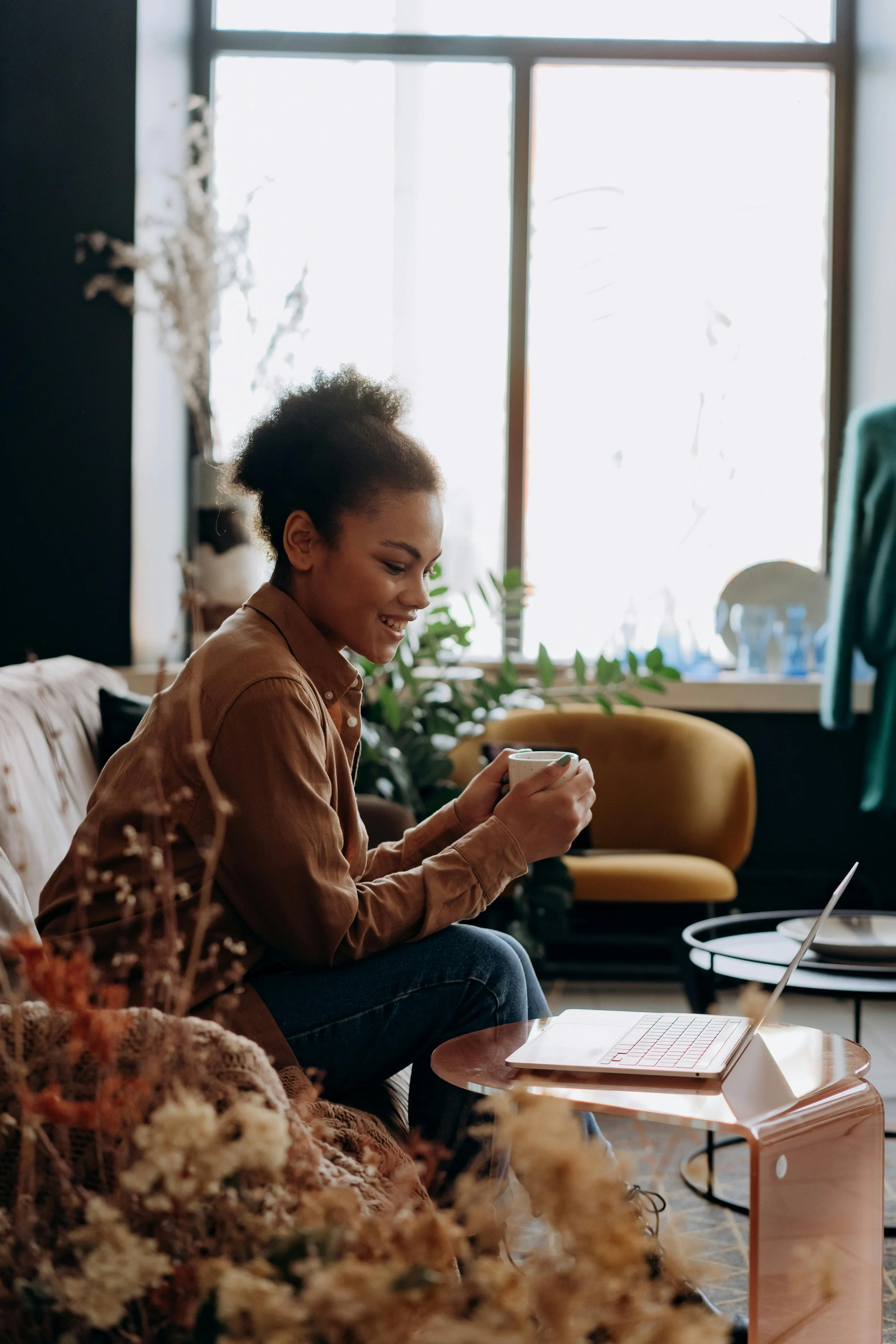 Client preparing for online trauma therapy session from home in British Columbia