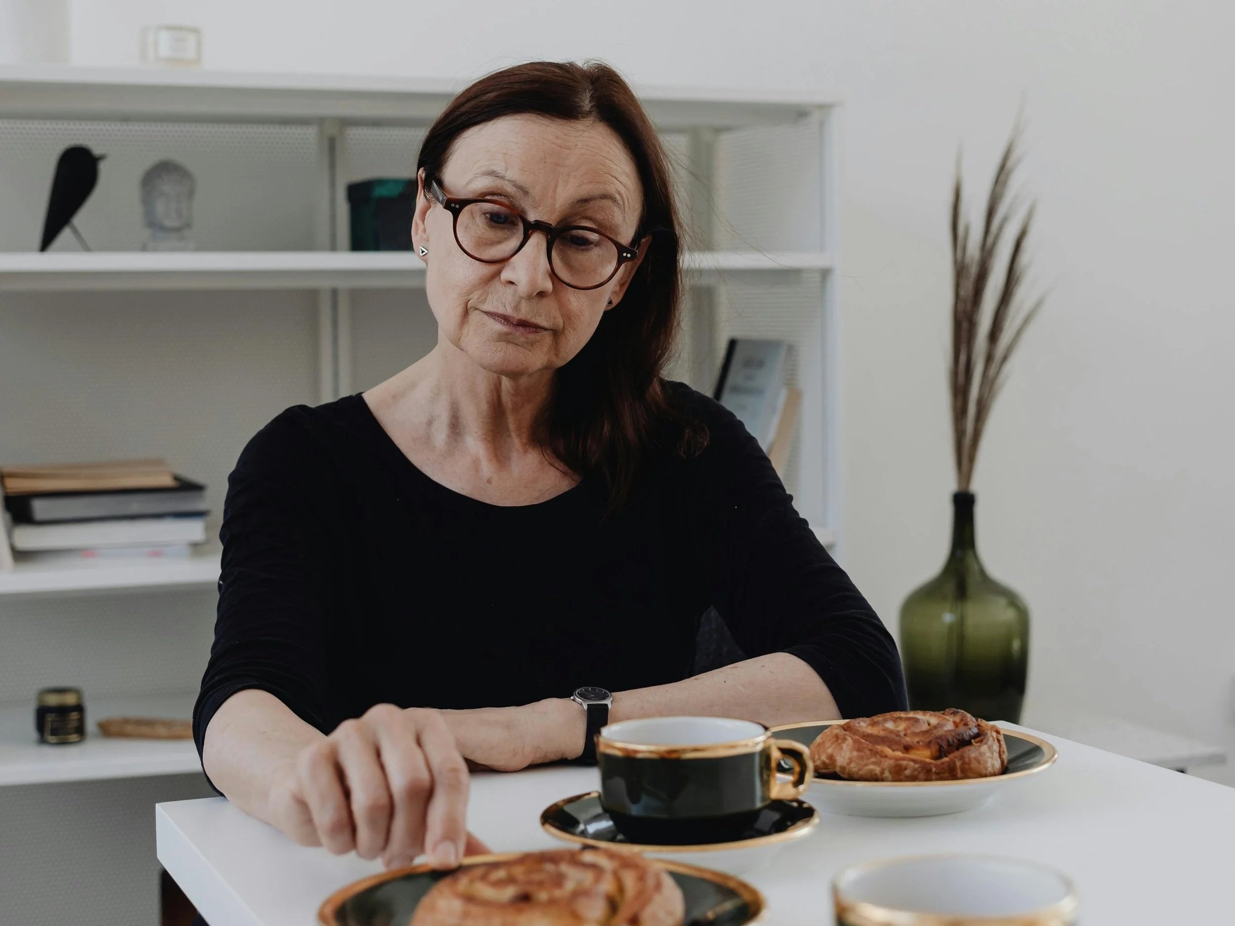 Parent experiencing guilt and self reflection in a quiet moment.