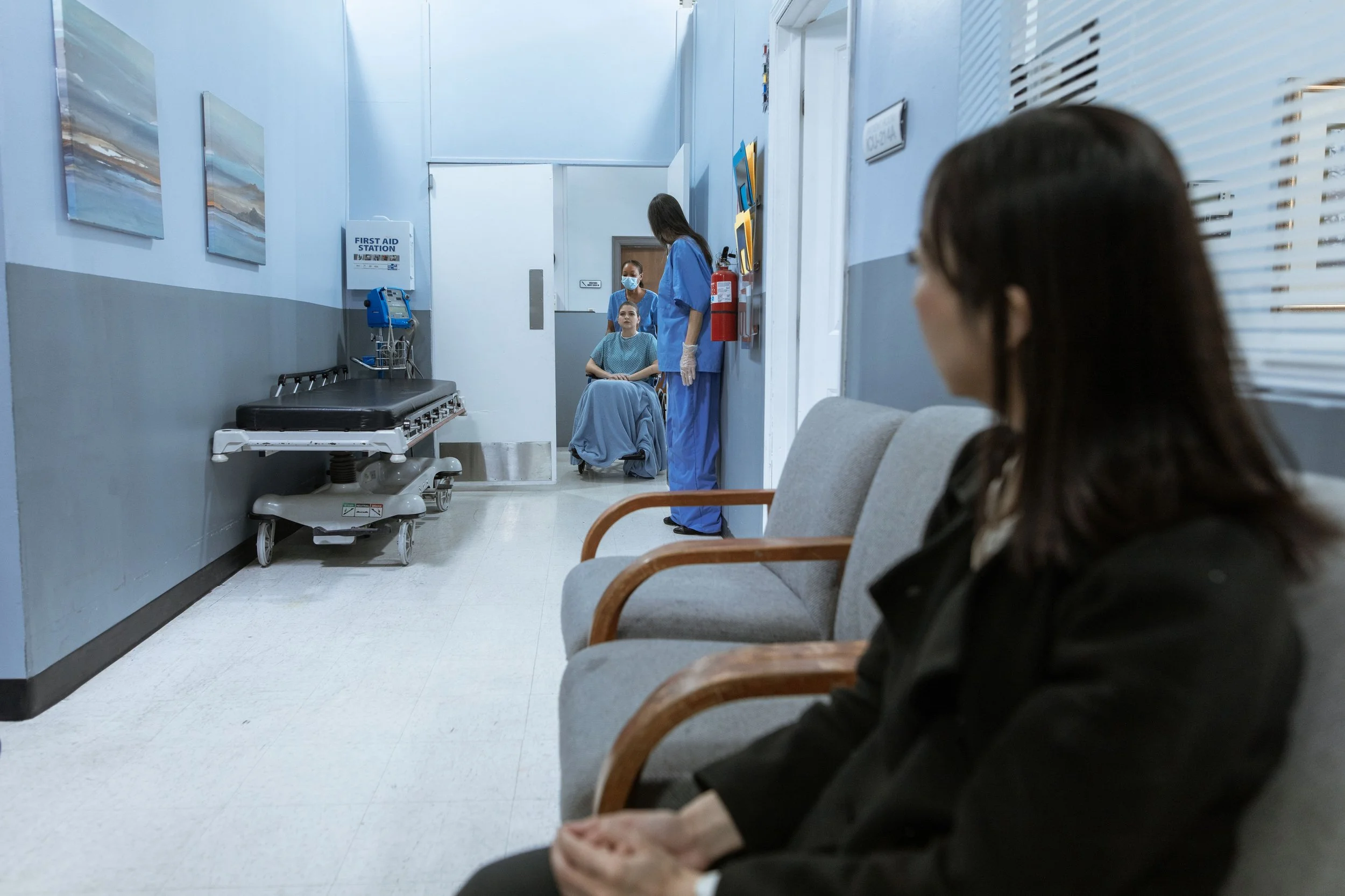 Person preparing written questions before a medical appointment