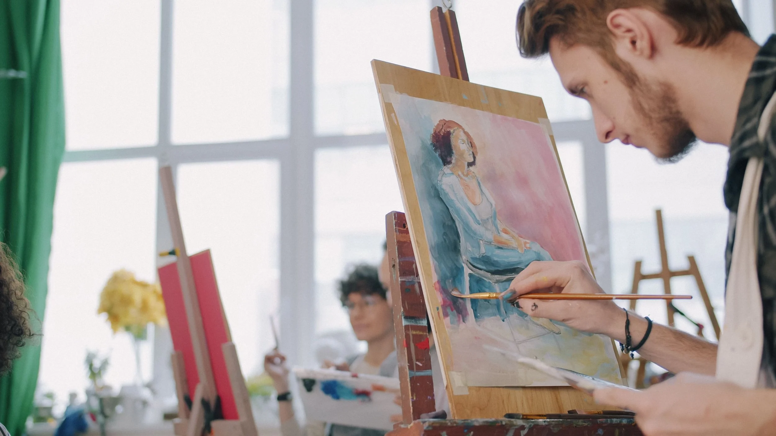 Adult experimenting with a creative hobby without pressure to produce a perfect result