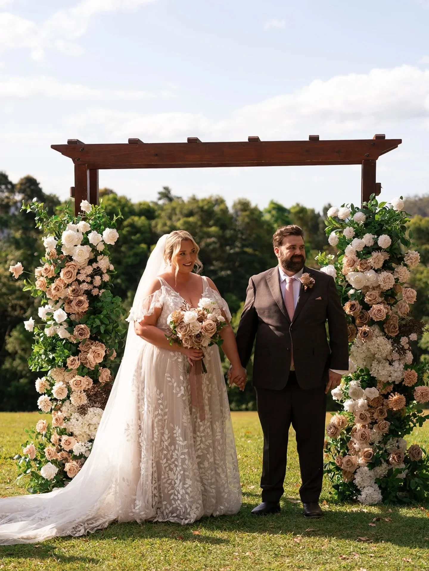 Mocha tones for Terri and David 🤎

Warm, layered neutrals and florals designed with intention from start to finish.

The aisle clouds were repurposed at reception tables, and the arbour florals transformed into statement pieces for the reception ent