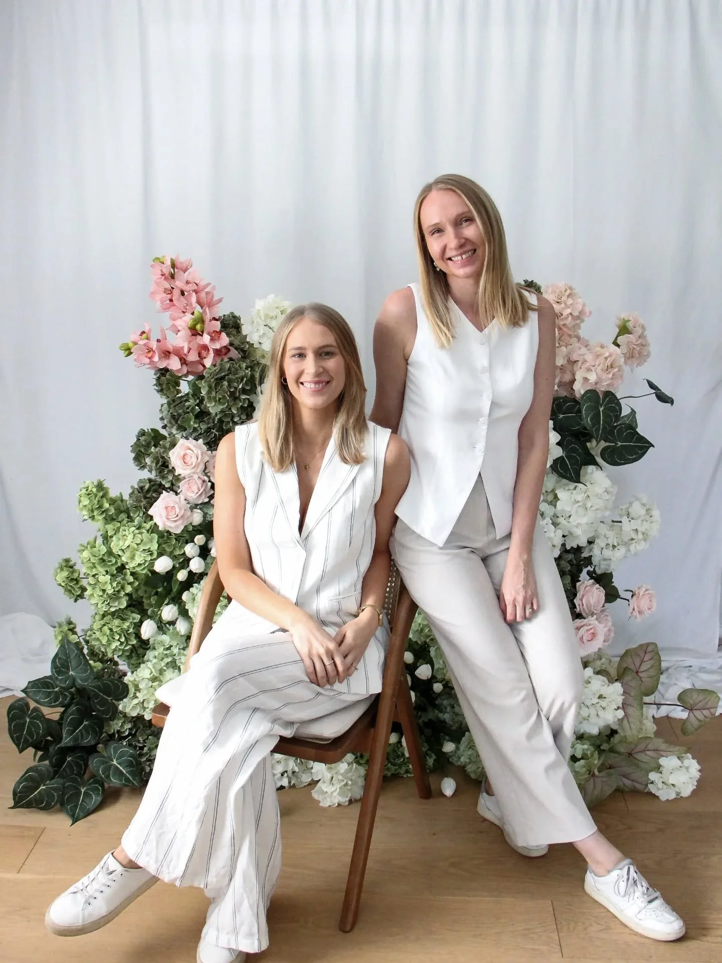 ✨ Ashleigh has entered the chat ✨

Which means it's time for introductions.

If you're new here, hi! I'm Anna (on the right 👋), the owner, lead faux flower designer, and the person behind bringing your Pinterest boards to life for the last few years