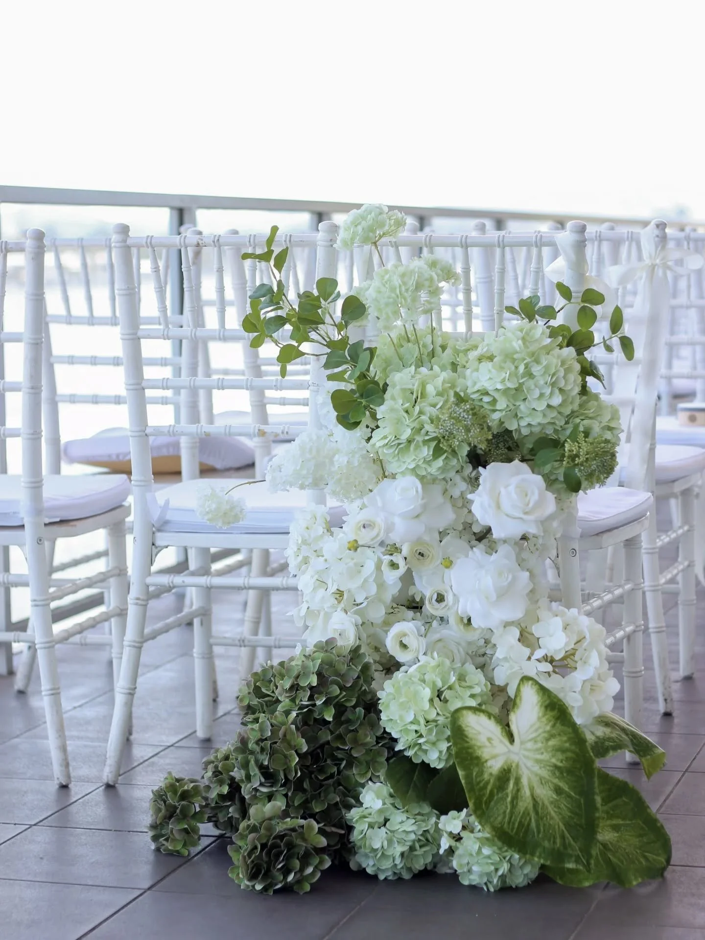 The secret to making your wedding flowers feel truly abundant? Cascades.

Whether they're spilling from the start of your aisle, draping over ceremony plinths, flowing from a fountain, trailing along your bridal table or adding movement to guest tabl