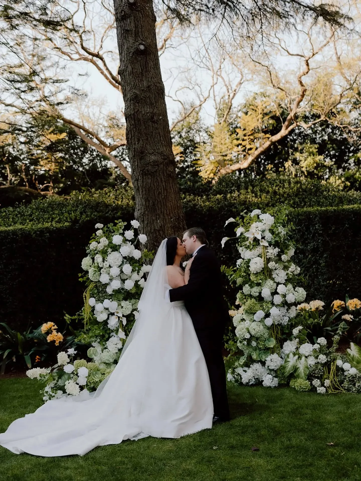 When your ceremony statement gets a second moment ✨

We love a little floral encore! These statement flower towers made their way from the ceremony to behind the sweetheart table, creating a whole new focal point for the reception. 

All of this happ