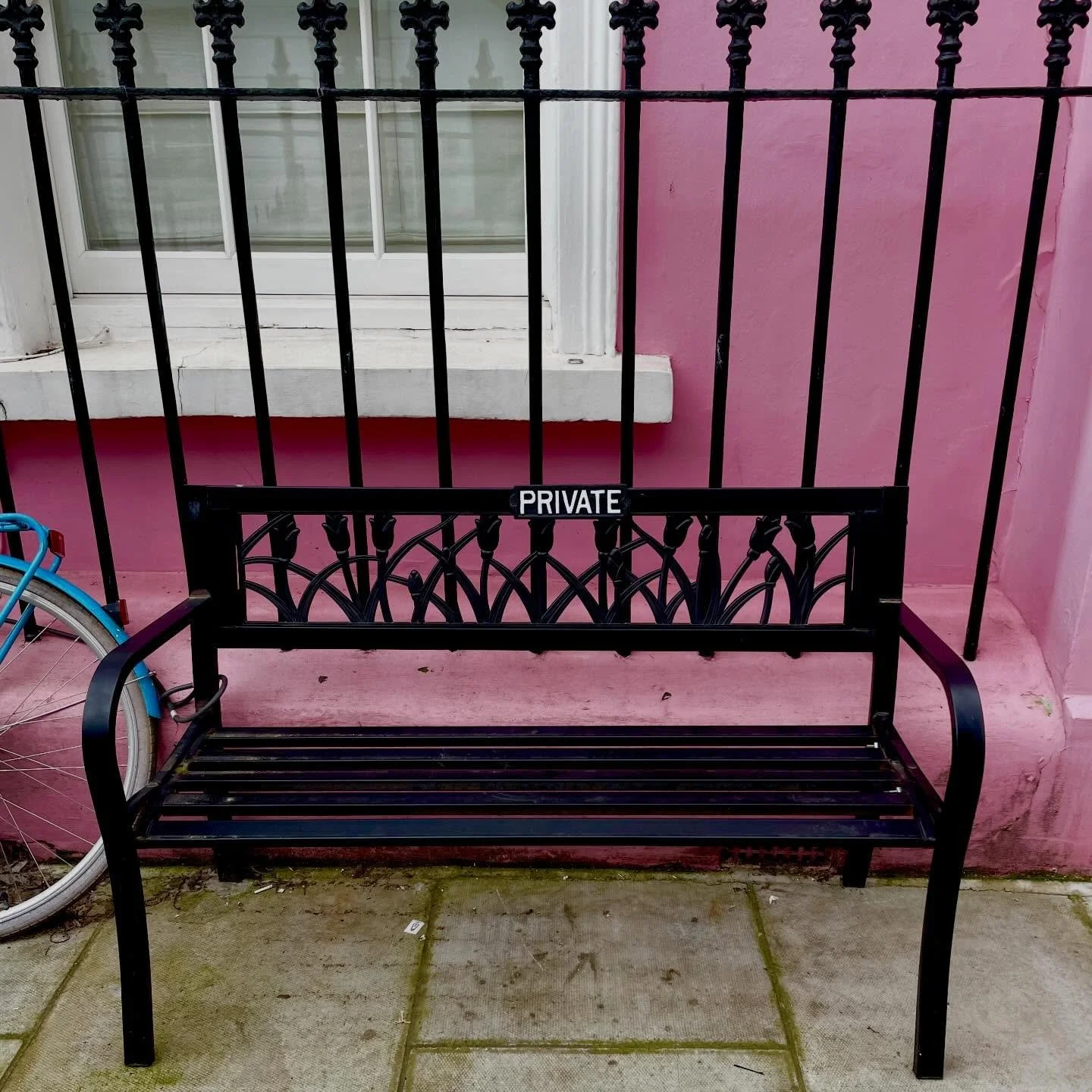 When you have a bench outside your pretty pink house in Chelsea.