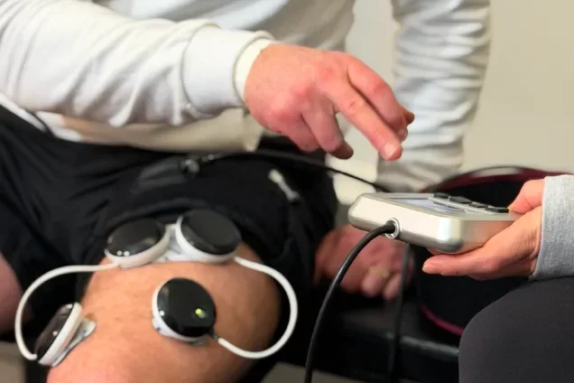 What is functional electrical stimulation (FES)?