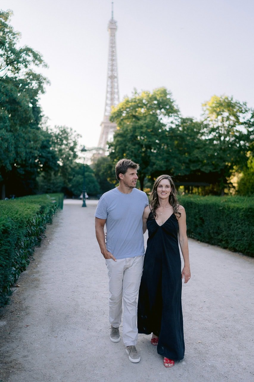 Relaxed family walking together during a photoshoot in Paris