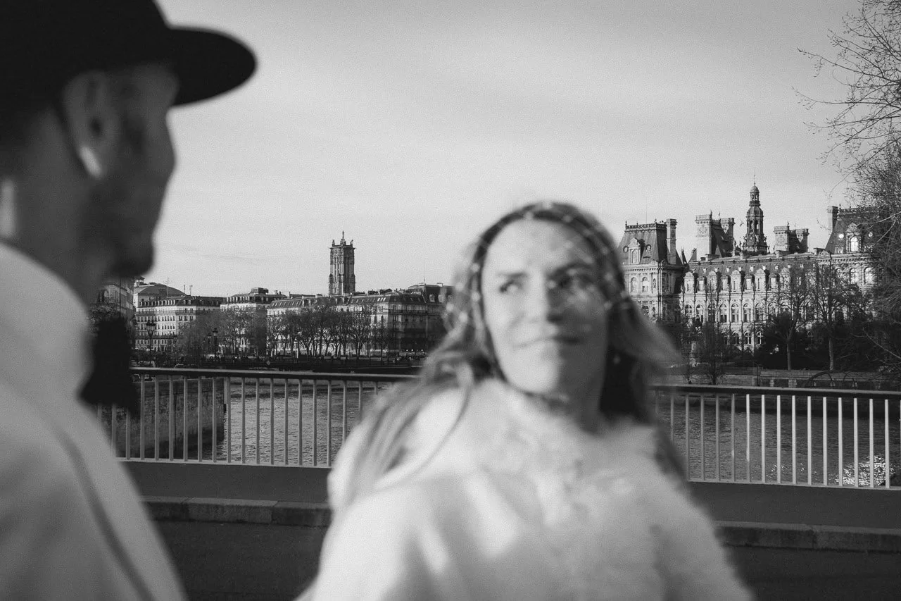 Romantic couple portrait in Paris with classic French architecture in the background