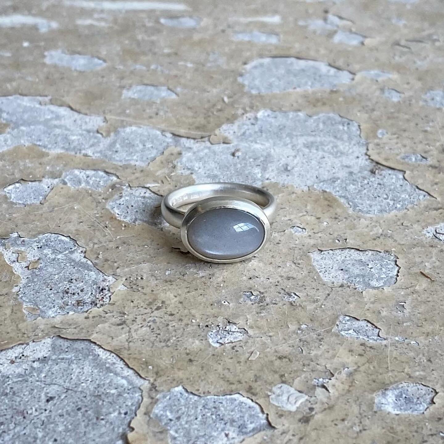 Like a dreamy December sky. Gray moonstone set in 925 silver. 
How do you keep up the spirit through the gray days of winter? I try to get outside during the day, most days that only means a short walk after lunch, mostly under gray skies, but I tell