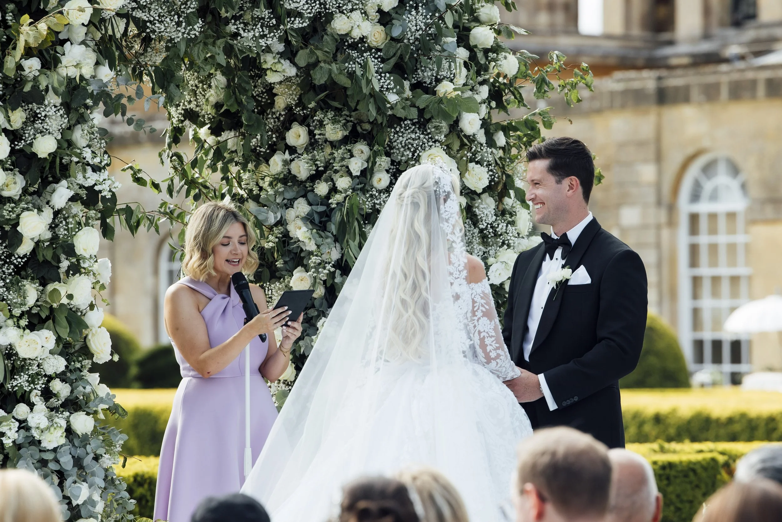 Bride and groom exchanging vows during their humanist wedding ceremony at Blenheim Palace