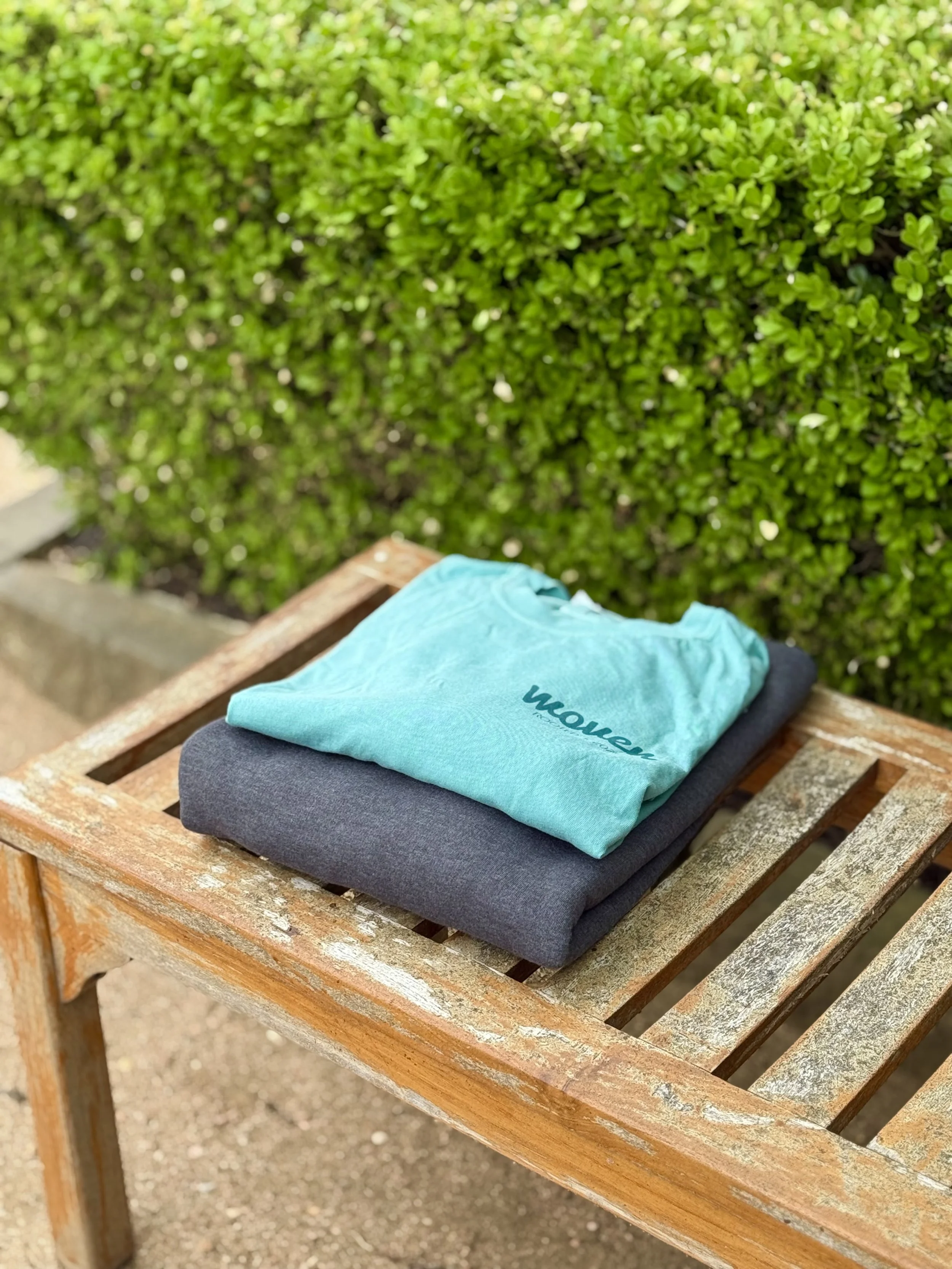 Woven Retreat 2025 T-Shirt - Folded.JPG