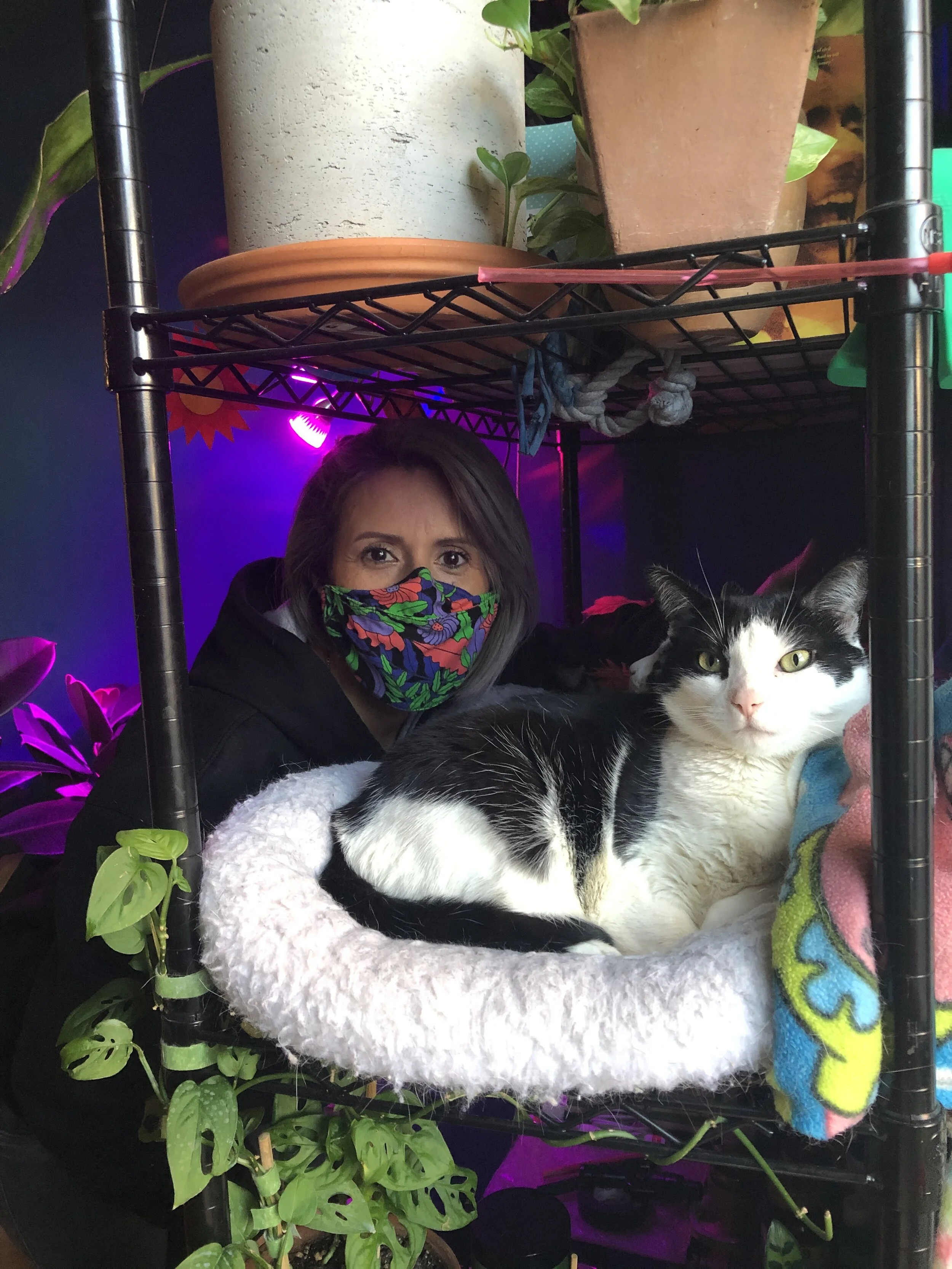 Day with her cat, Mr. Miracle.