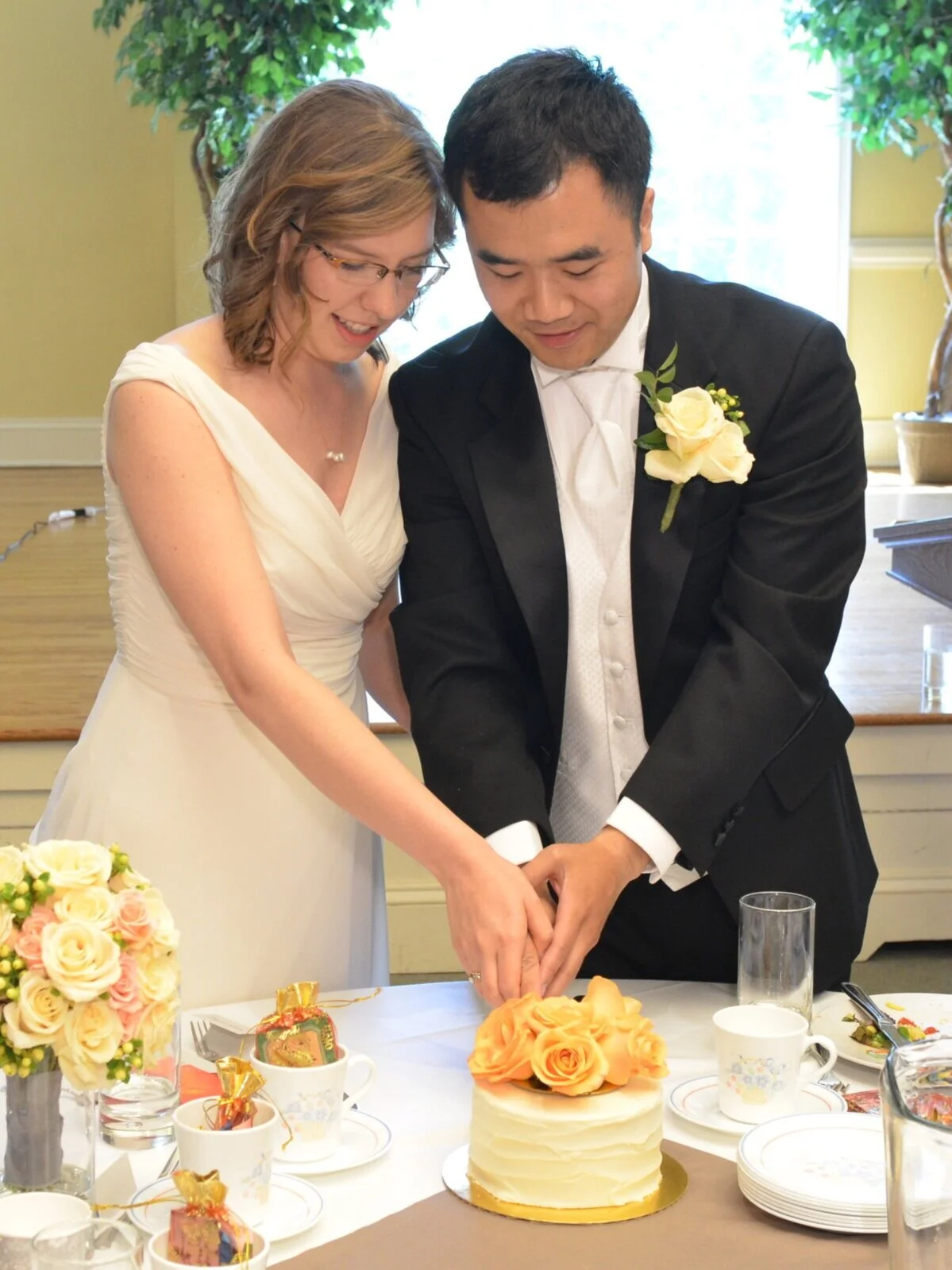 Mini jasmine tea infused wedding cake with cream cheese frosting for each guest table