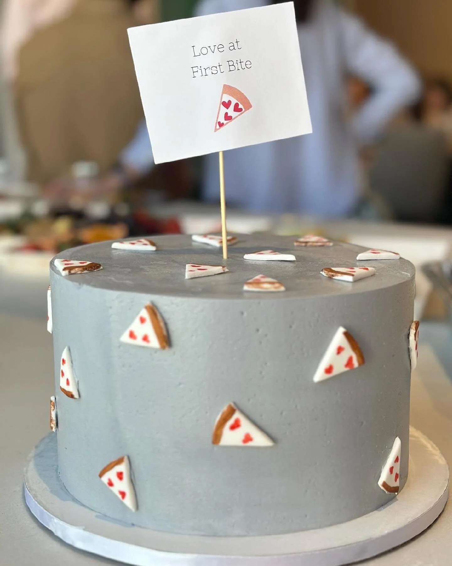 When you&rsquo;re celebrating a baby-to-be who&rsquo;s referred to as &ldquo;Baby Pizza,&rdquo; you have double chocolate cake with Italian meringue buttercream and tiny, hand-painted fondant pizzas! #loveatfirstbite #chocolatecake #chocolateganache 