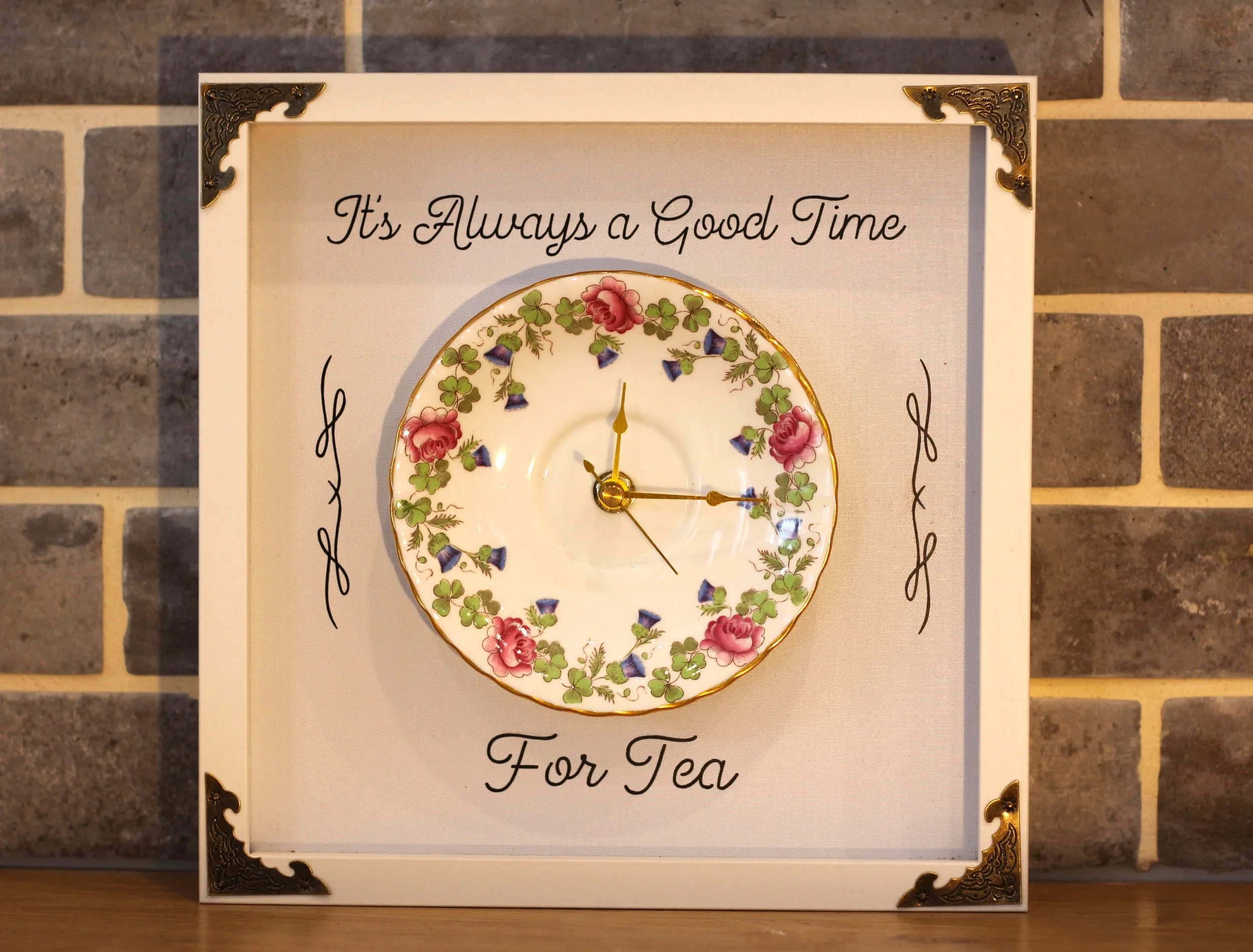 Tea time clock green vine with pink flowers.JPG