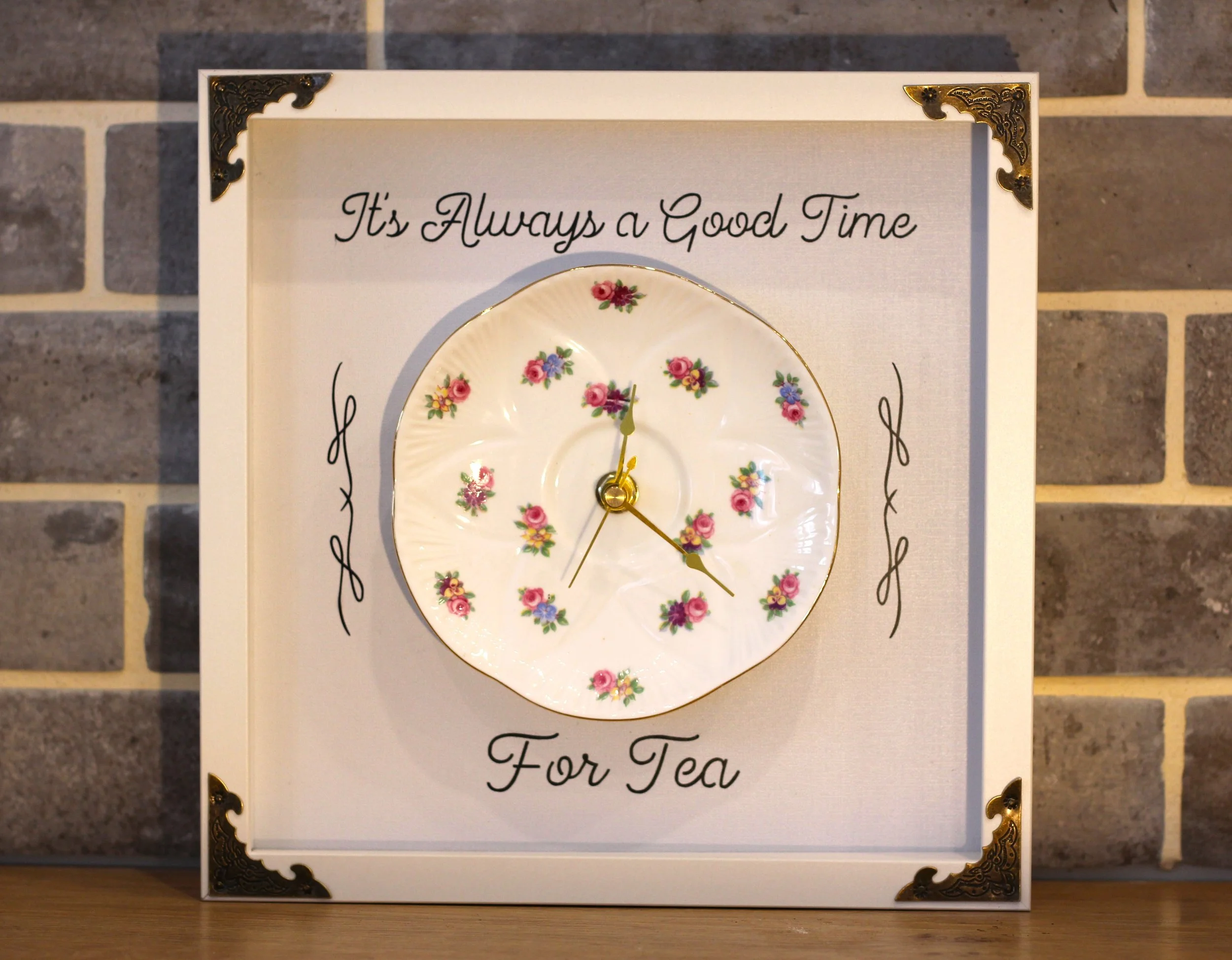 Tea time clock with mini floral dots.JPG