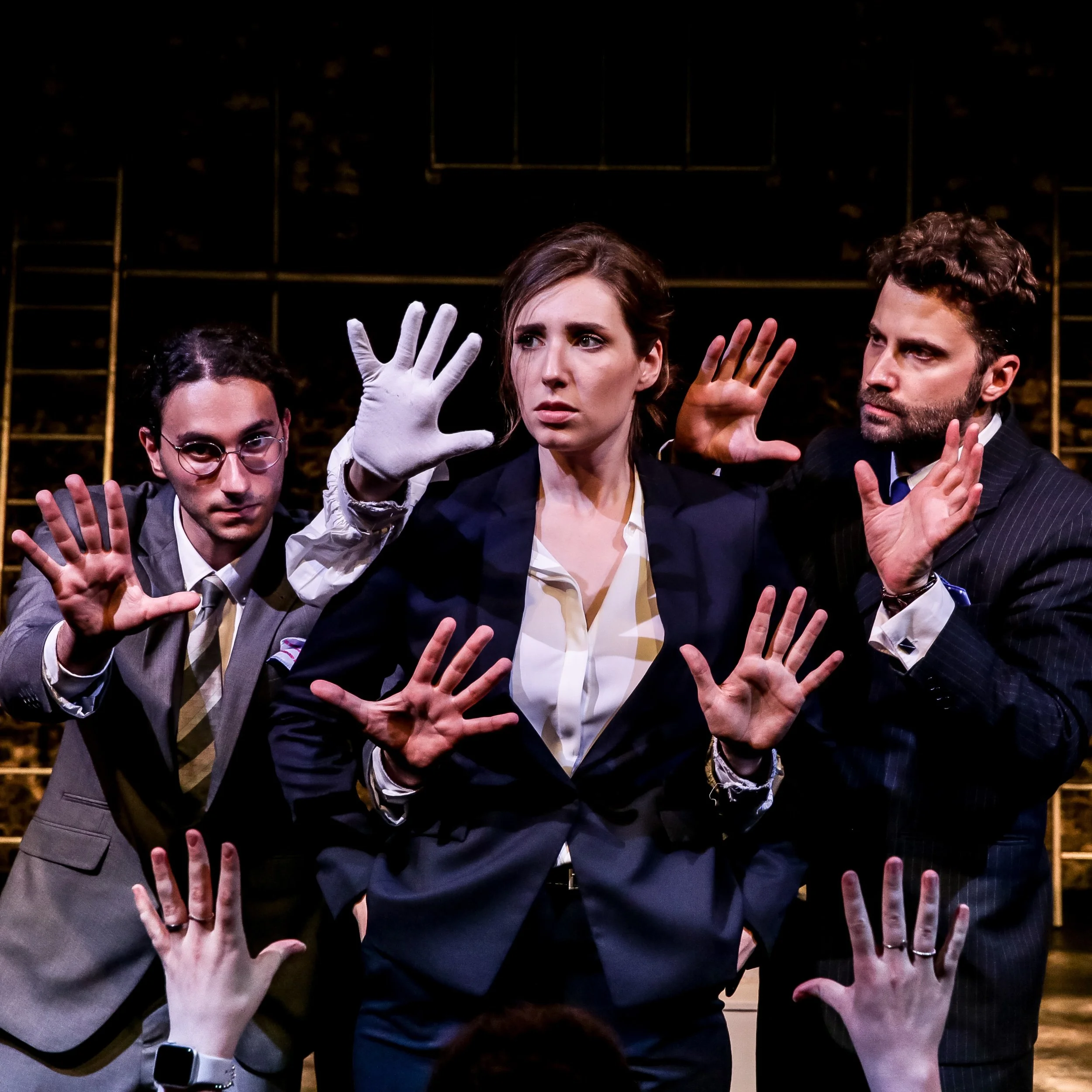 Characters dressed in corporate wear splay their hands